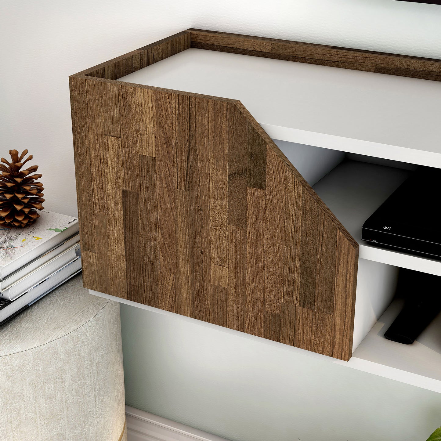 Left angled close-up hidden door detail view of a transitional white and wood four-shelf floating TV stand in a living room with accessories