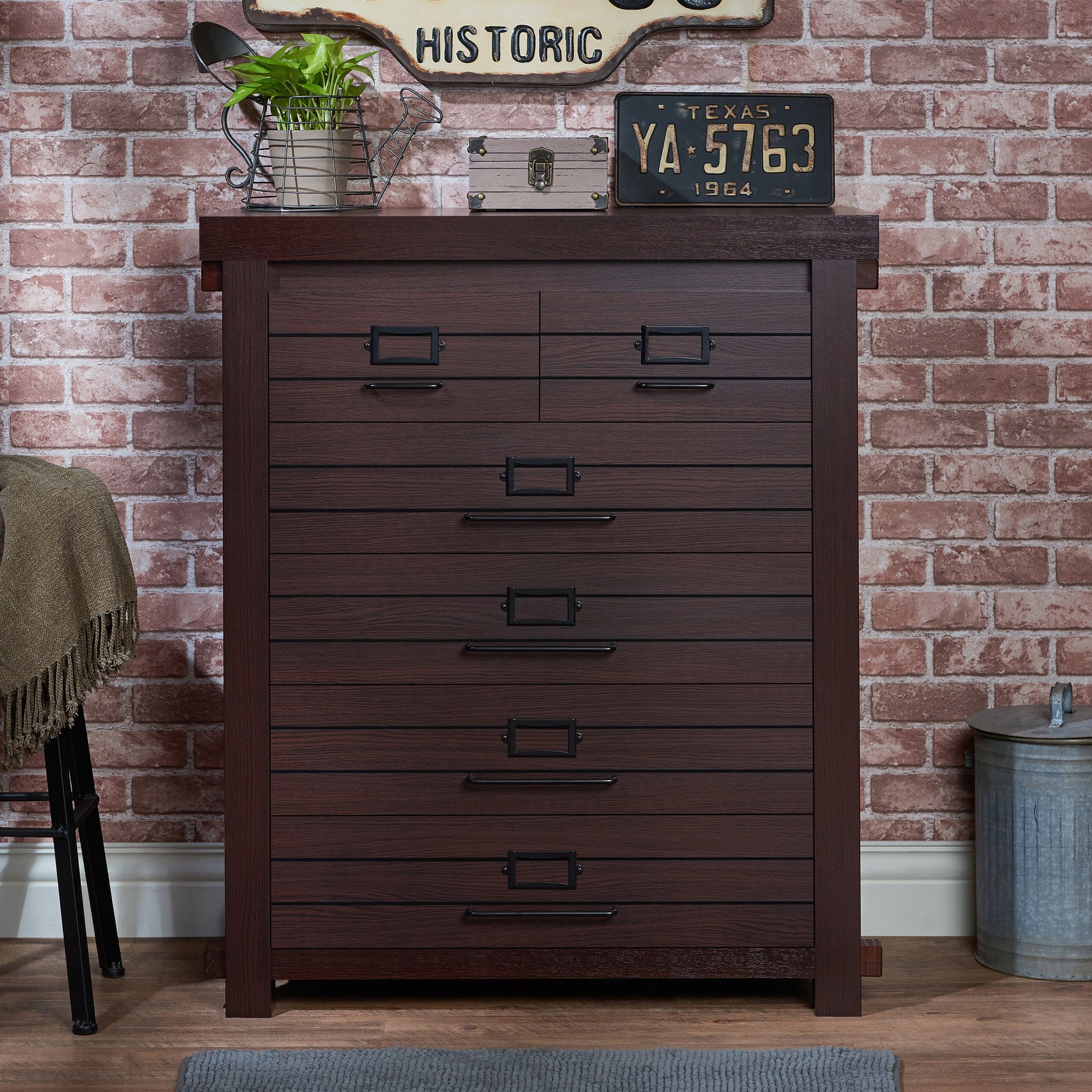 Front-facing rustic espresso six-drawer plank chest dresser in a living space with accessories