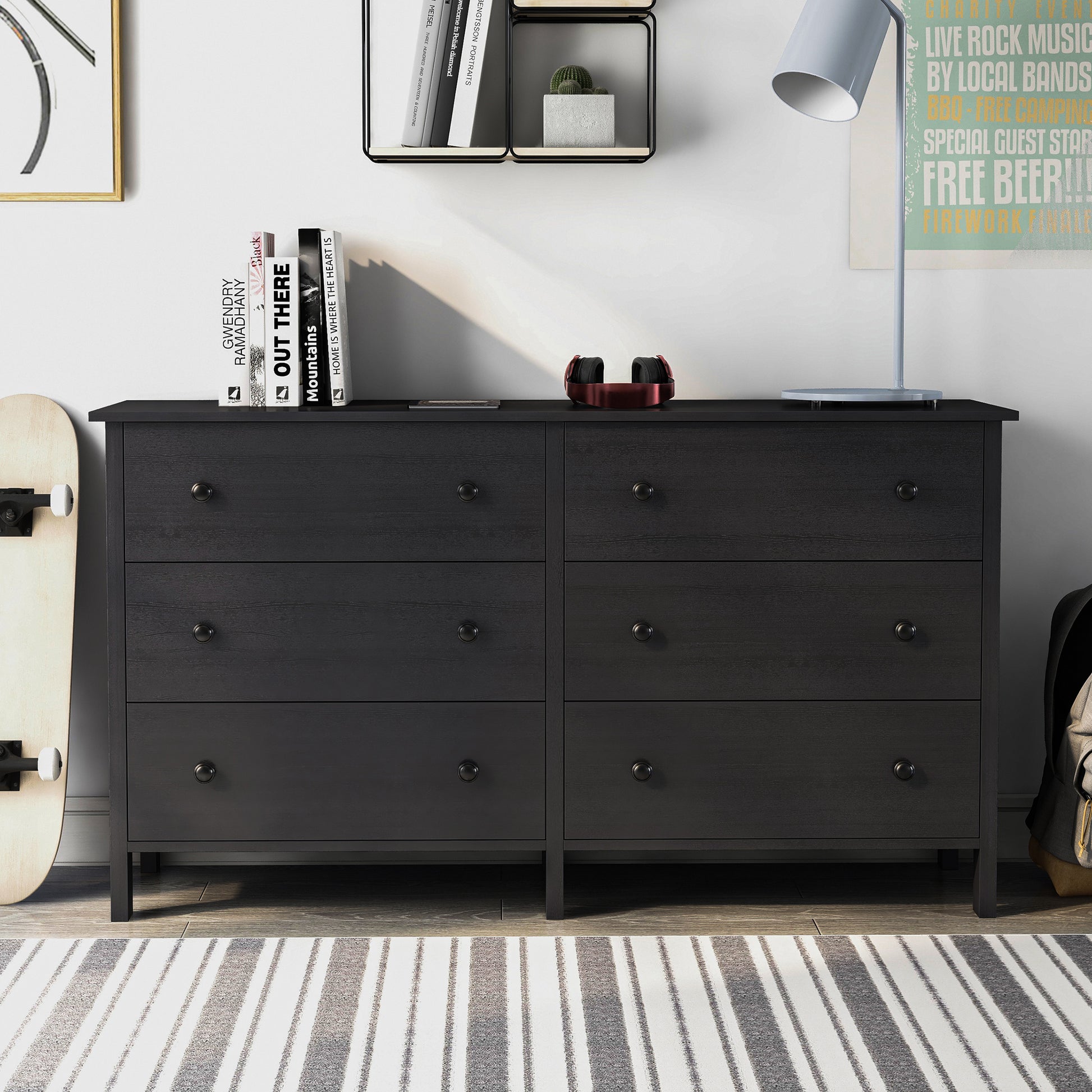 Front-facing transitional black six-drawer youth dresser in a bedroom with accessories