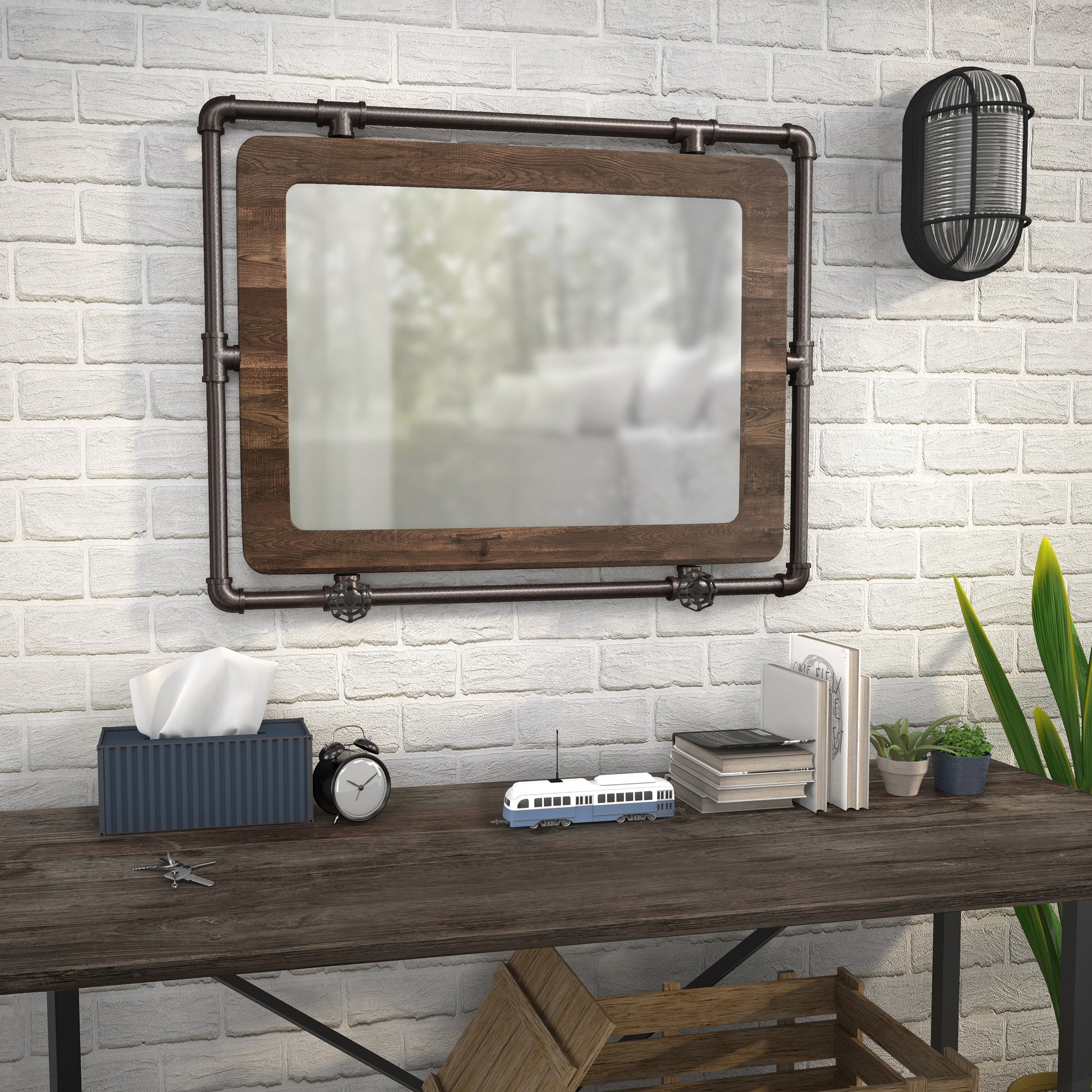 Right angled industrial reclaimed oak and water pipe wall mirror over a table with accessories