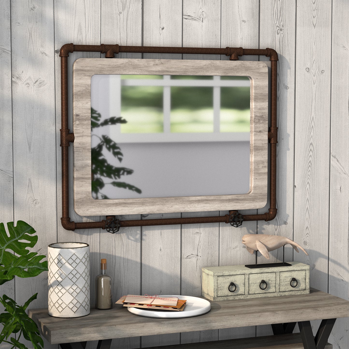 Right angled industrial vintage gray oak and water pipe wall mirror over a table with accessories