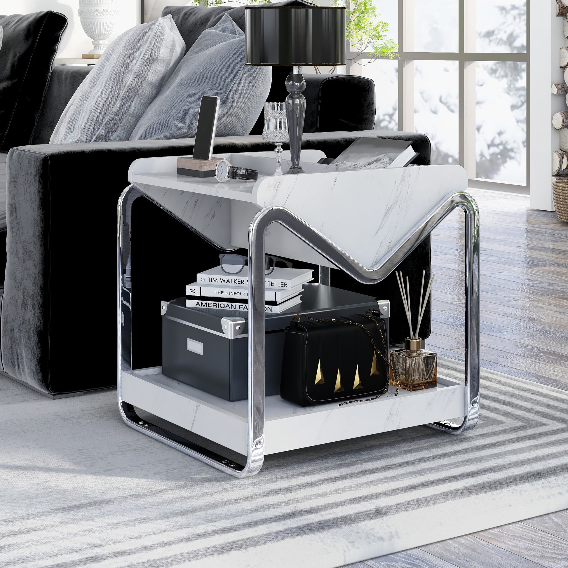 Left angled contemporary faux white marble and chrome three-shelf end table in a living room with accessories