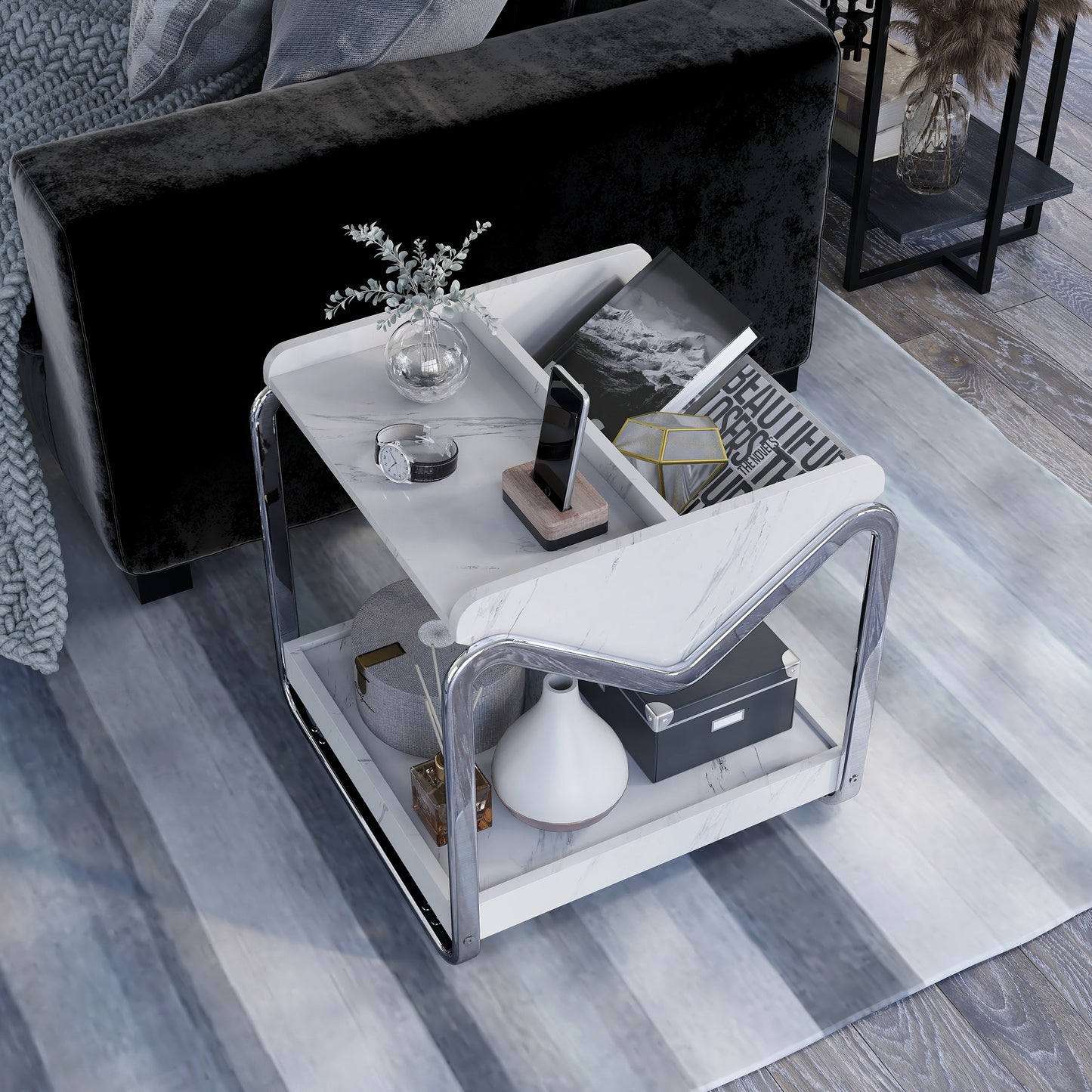 Left angled bird's eye view of a contemporary faux white marble and chrome three-shelf end table in a living room with accessories
