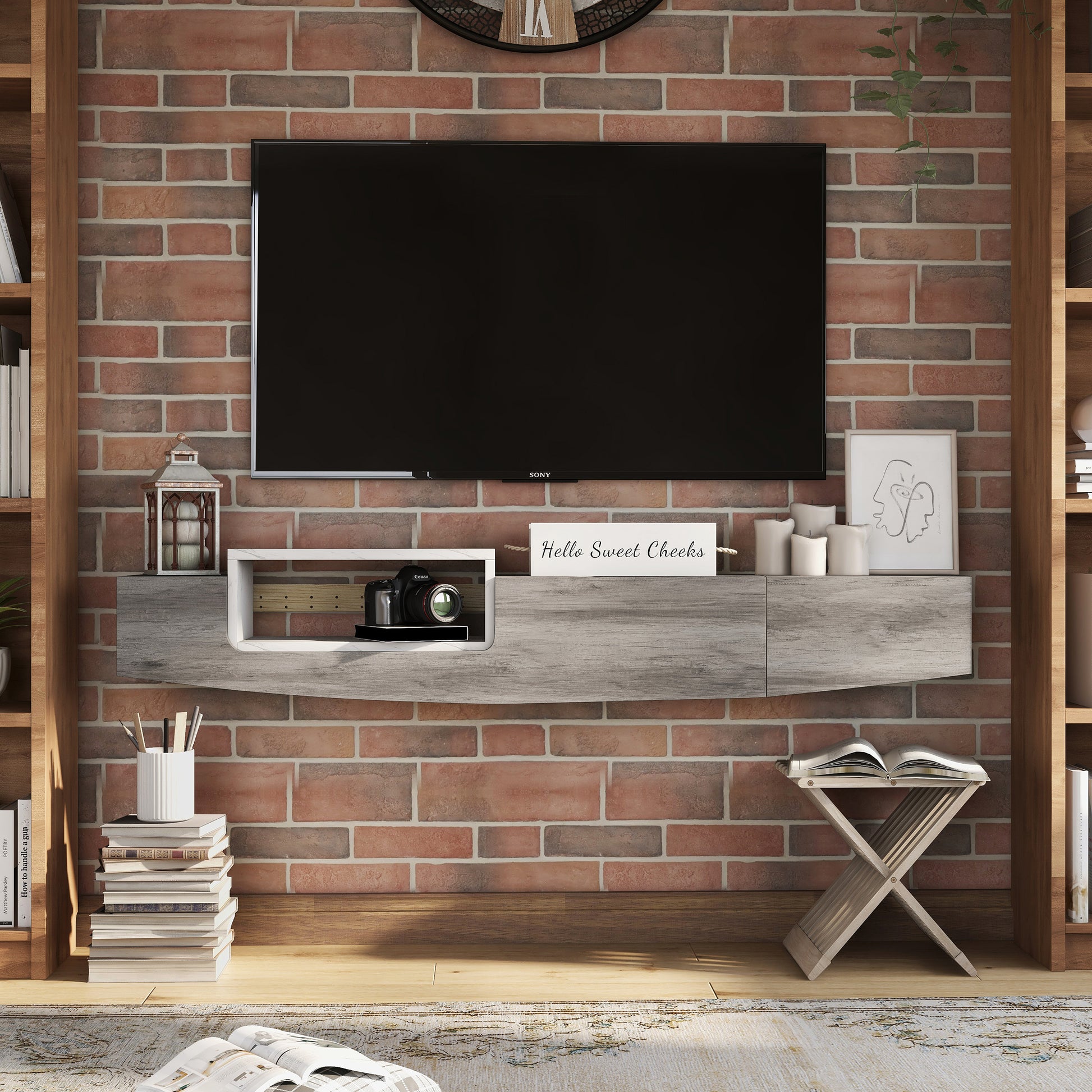 Front-facing farmhouse vintage gray oak and white one-drawer lift-top floating TV console in a living room with accessories
