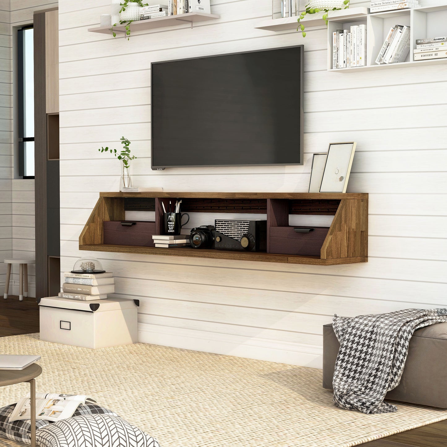 Left angled modern light hickory and wine multi-shelf floating TV console in a living room with accessories