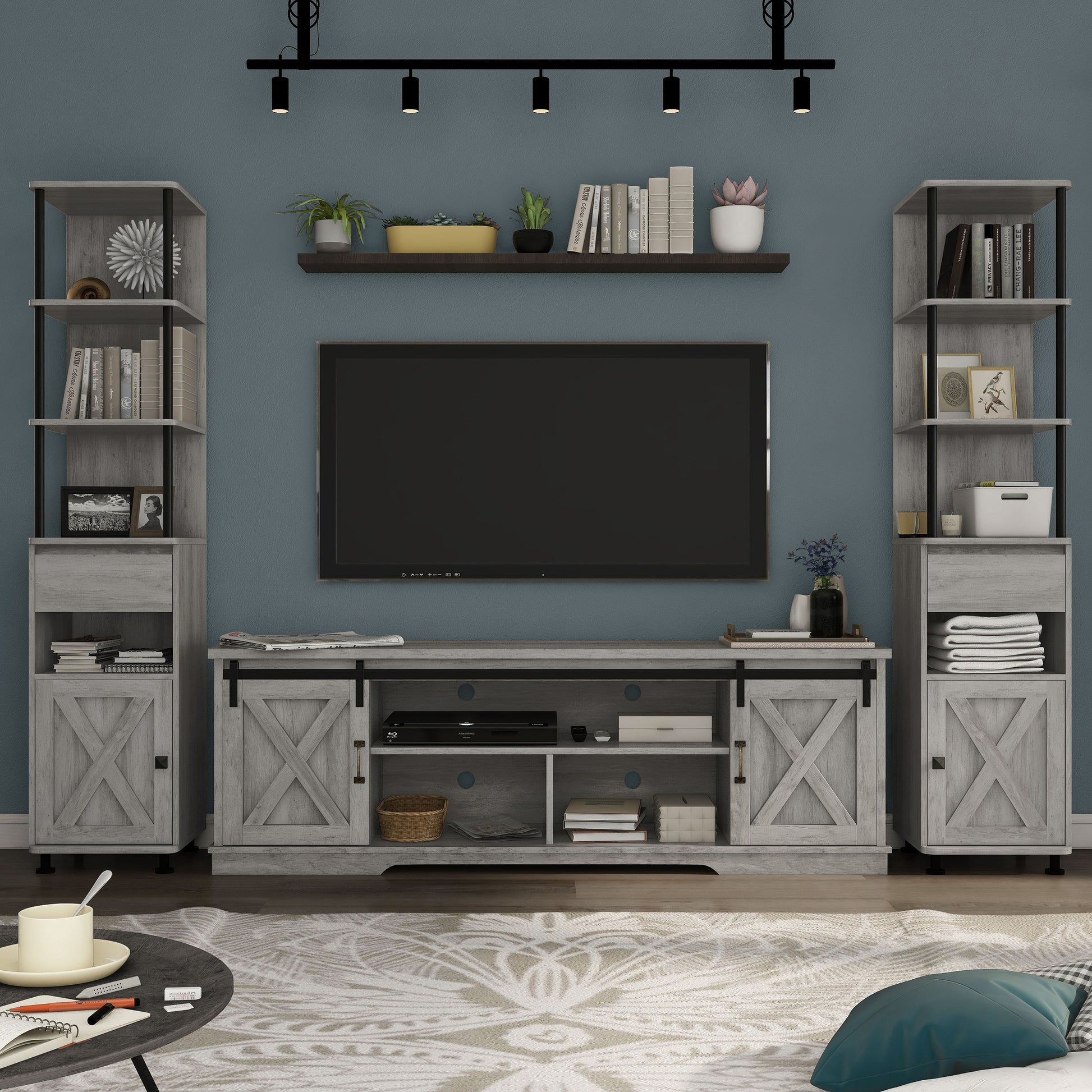 Front facing three-piece rustic vintage gray oak TV stand and pier entertainment set in a living room with accessories