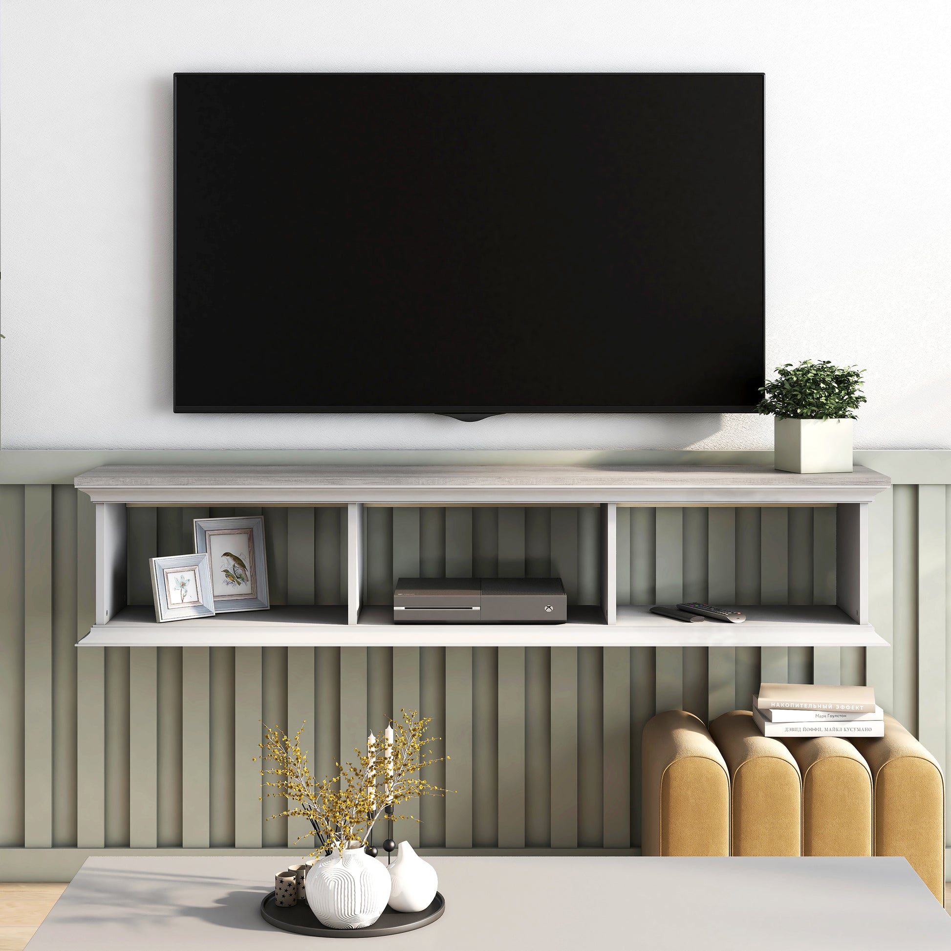 Front-facing transitional vintage gray oak and white floating TV stand with three shelves in a living room with accessories