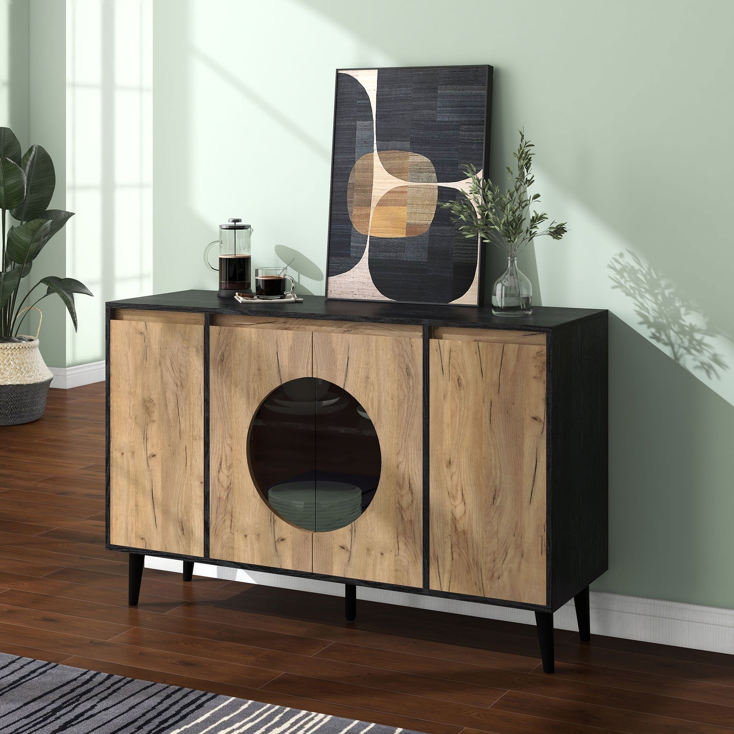 Left angled modern light oak and black six-shelf buffet with four doors in a living area with accessories