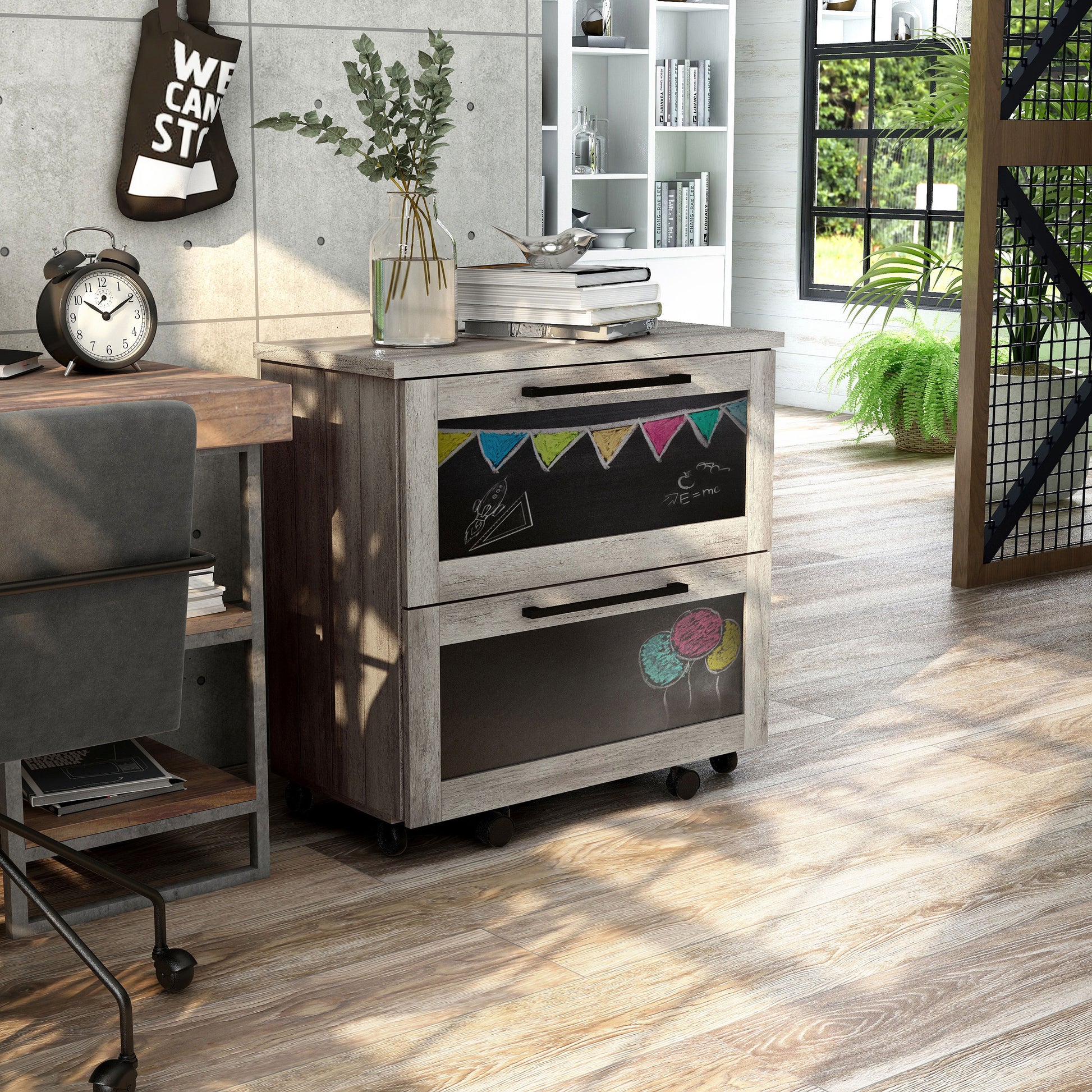 Right angled rustic vintage gray oak two-drawer mobile filing cabinet with chalkboard drawer fronts in a home office with accessories and chalk drawings