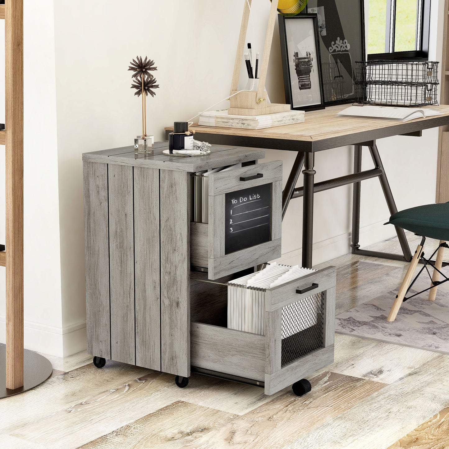 Right angled rustic vintage gray oak two-drawer mobile file cabinet with mesh and chalkboard drawers open in a home office with chalk drawing and accessories