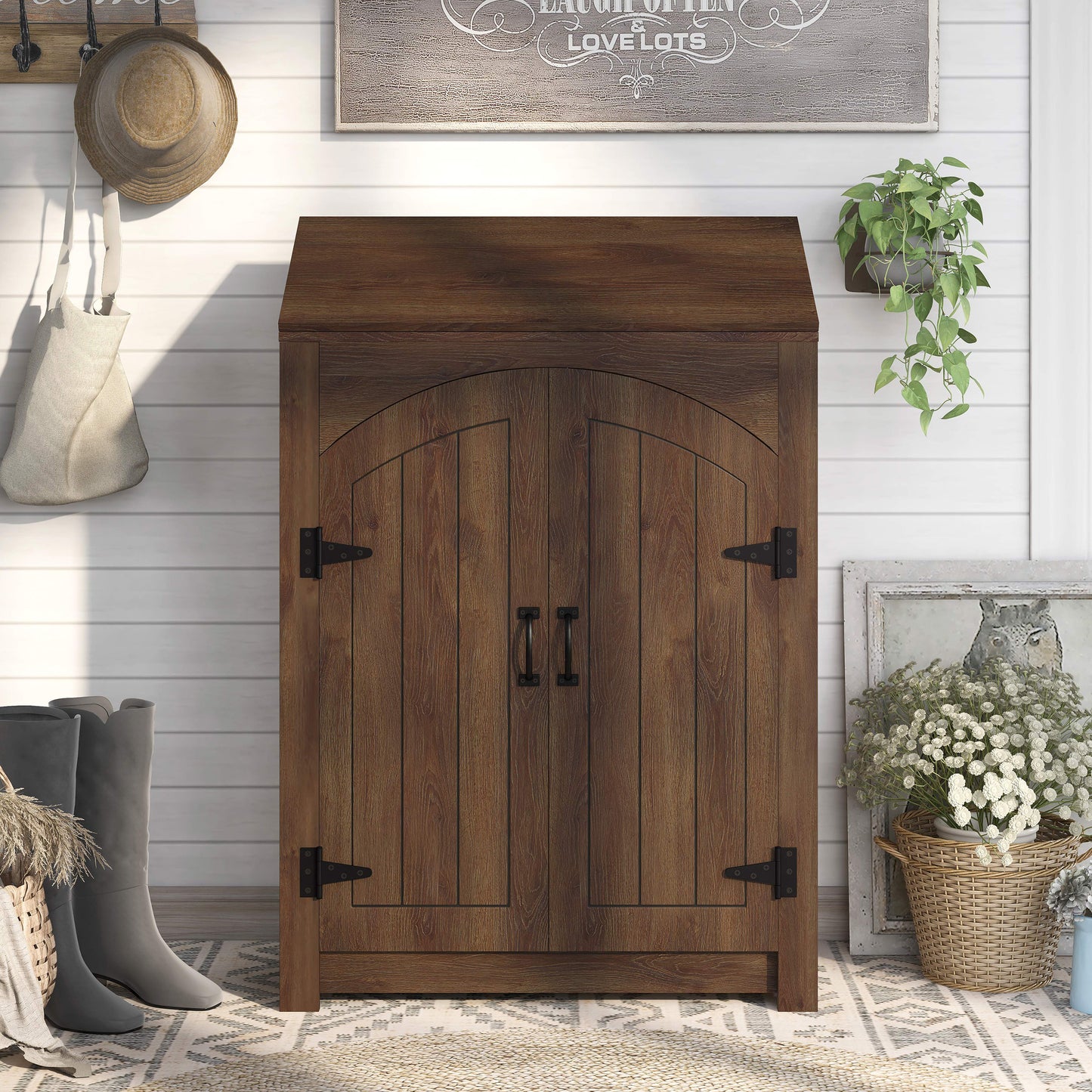 Front-facing farmhouse distressed walnut four-shelf shoe cabinet with a lift-top in an entryway with accessories
