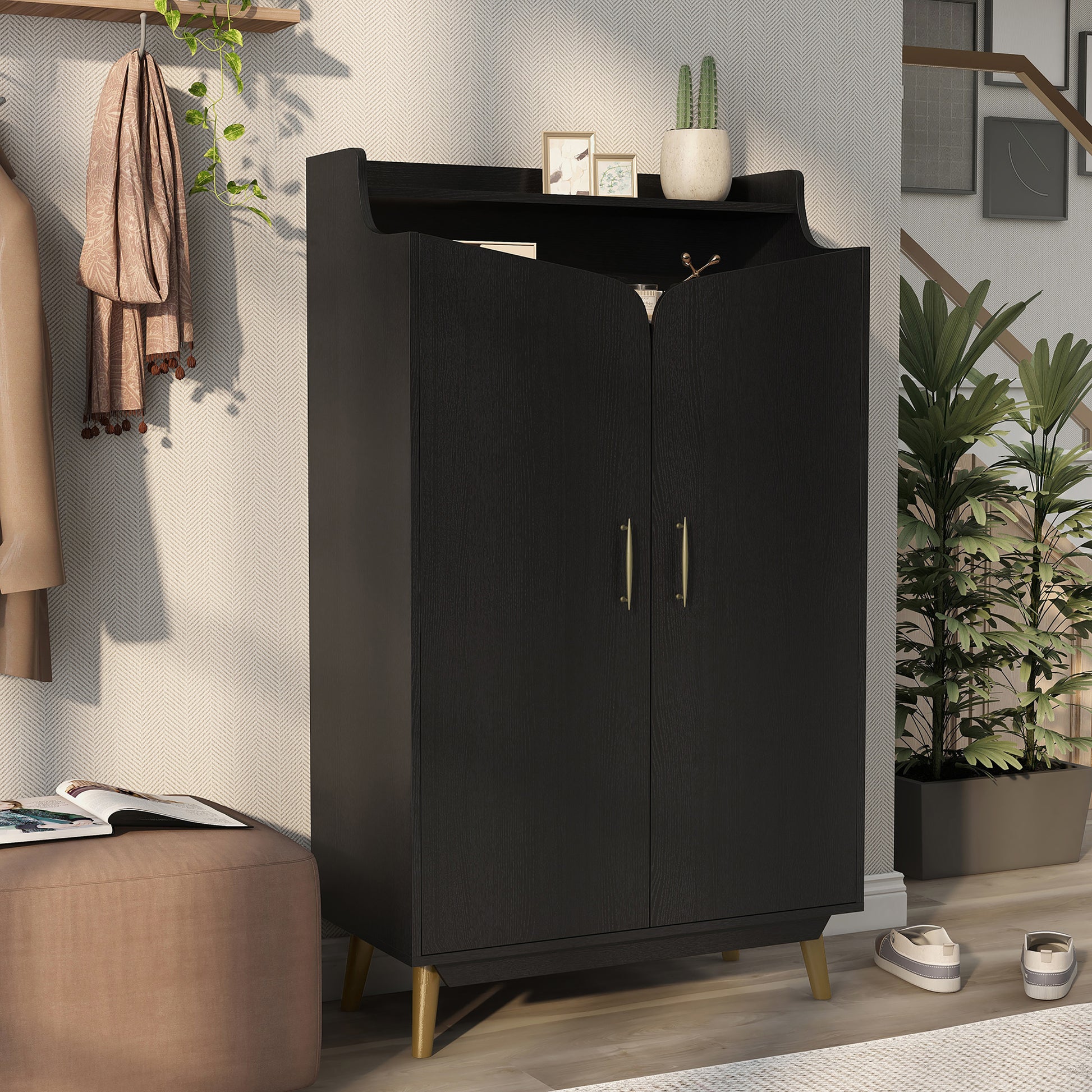 Right angled transitional black and gold two-door 14-pair shoe cabinet in an entryway with accessories