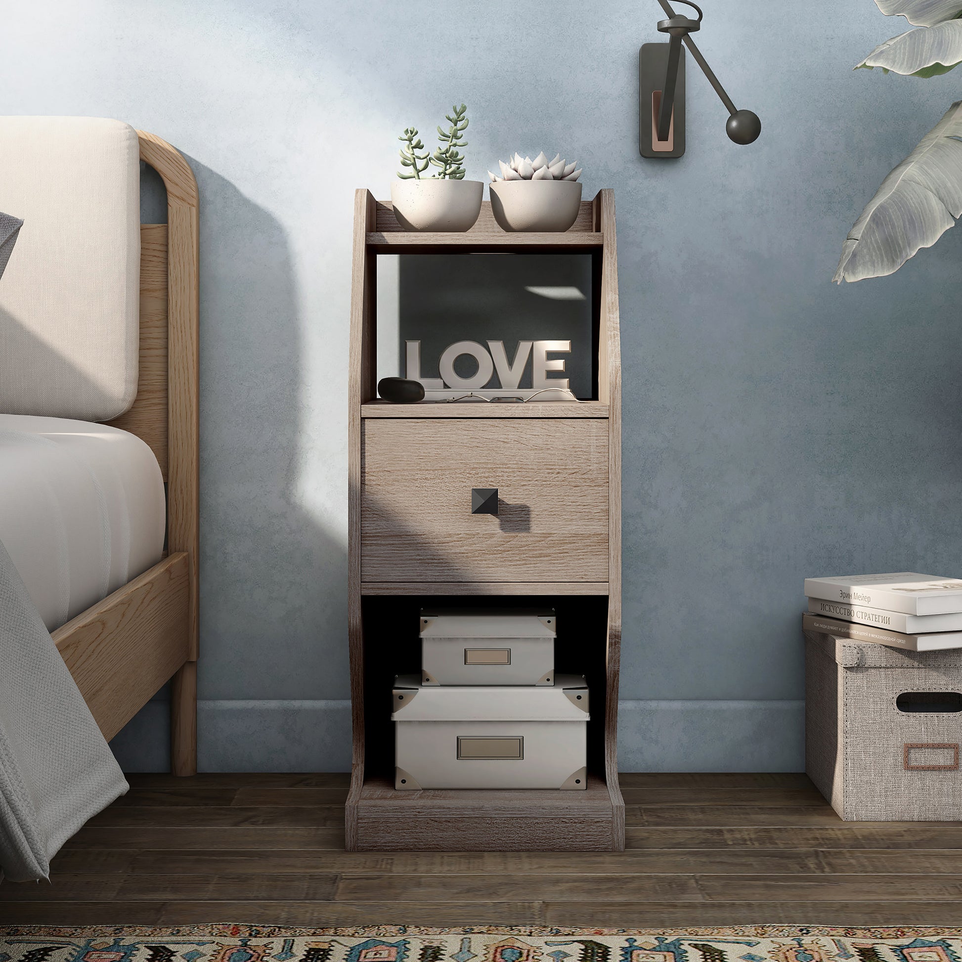 Front-facing transitional natural oak tiered one-drawer nightstand in a bedroom with accessories