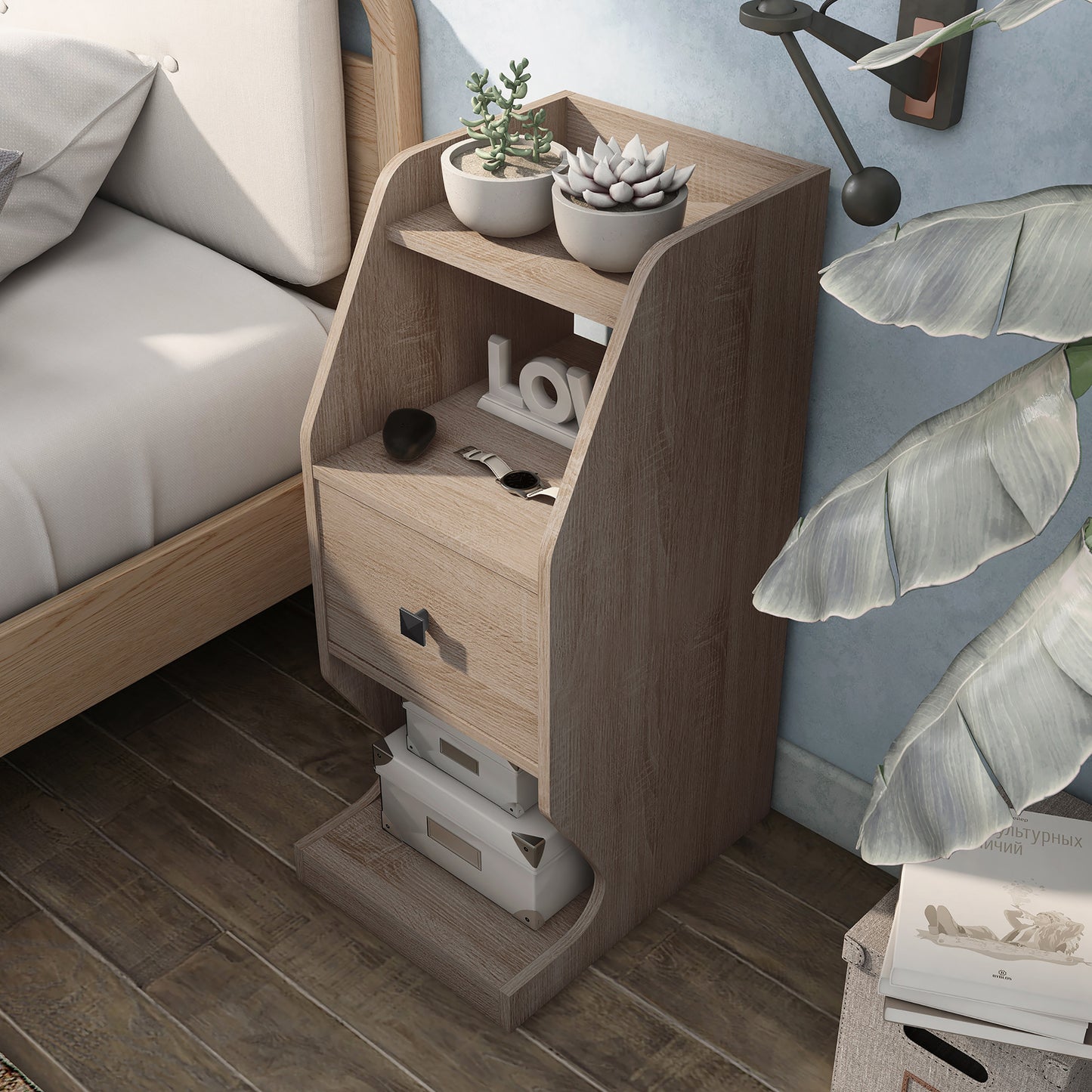 Left angled bird's eye view of a transitional natural oak tiered one-drawer nightstand in a bedroom with accessories