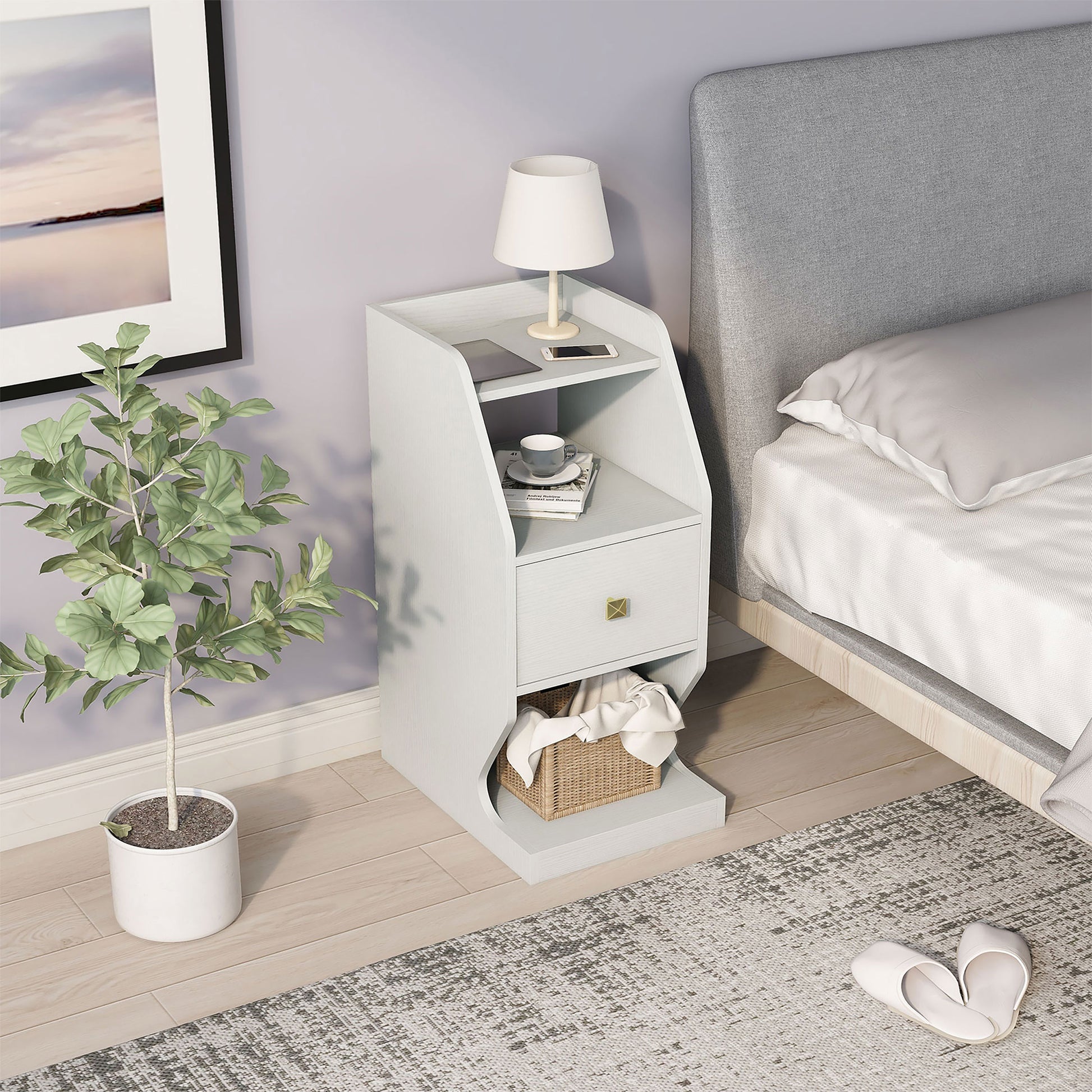 Right angled upper view transitional white tiered one-drawer nightstand in a bedroom with accessories