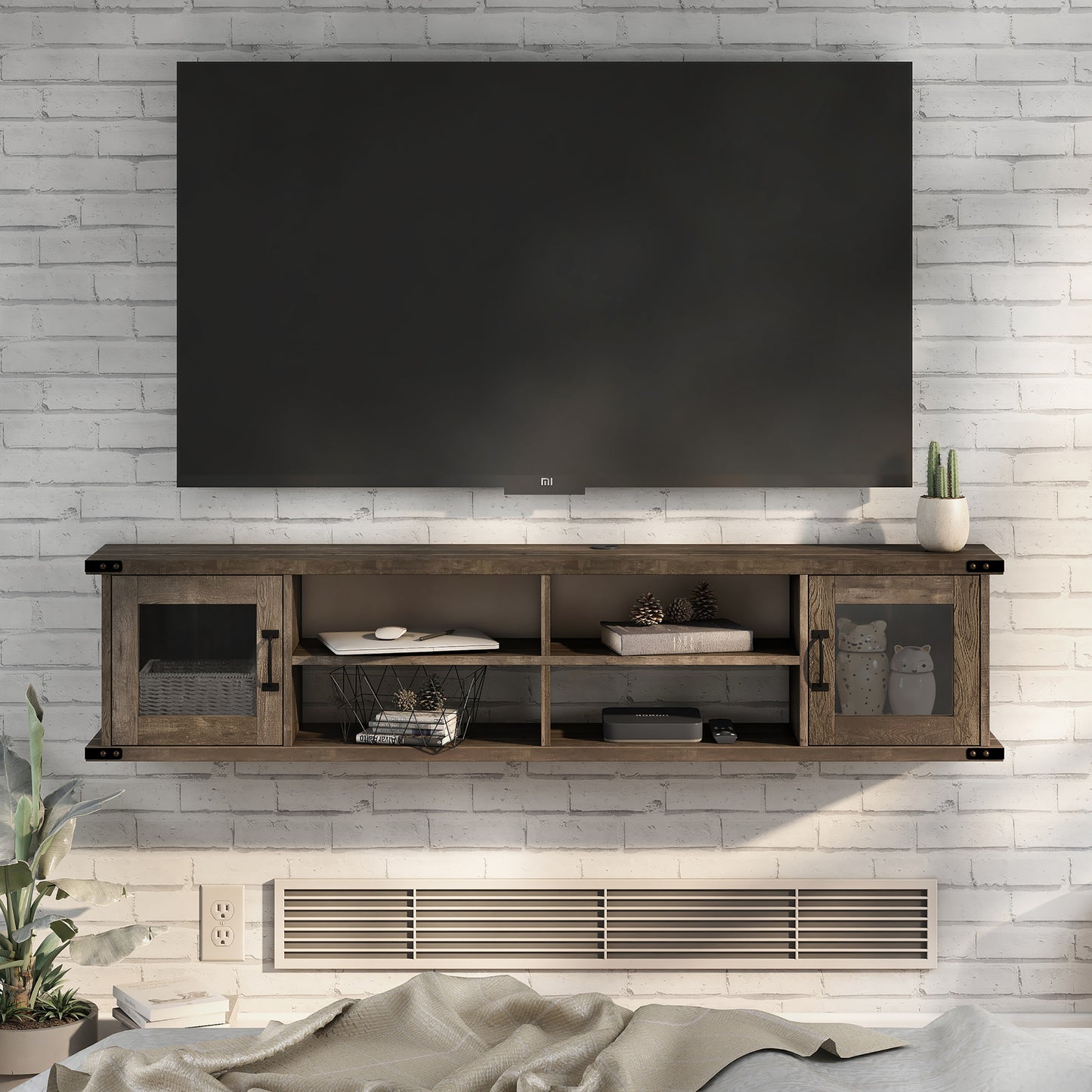 Front-facing modern reclaimed oak four-shelf wall mountable TV stand with glass doors in a living room with accessories