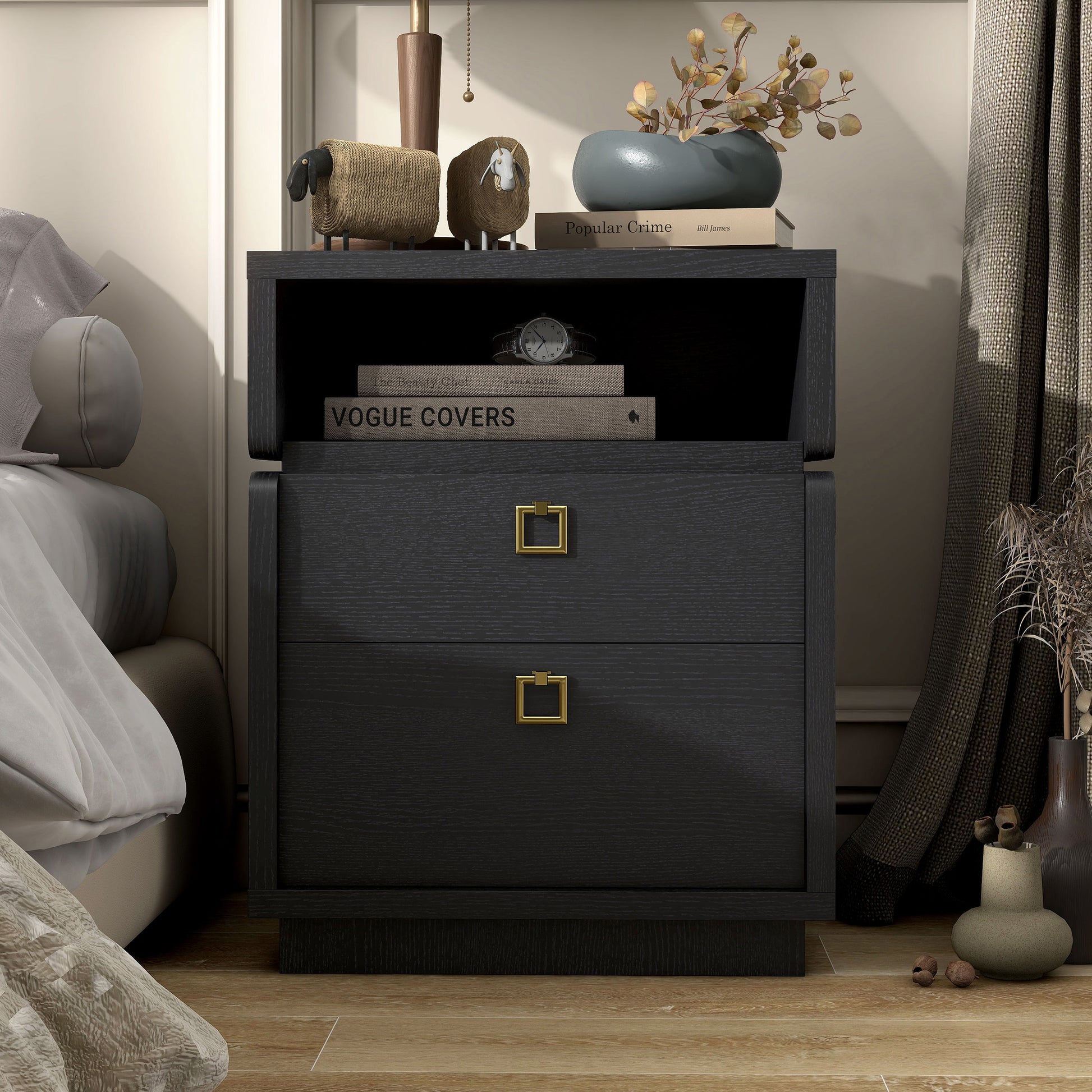 Front-facing modern black two-drawer nightstand/end table in a bedroom with accessories
