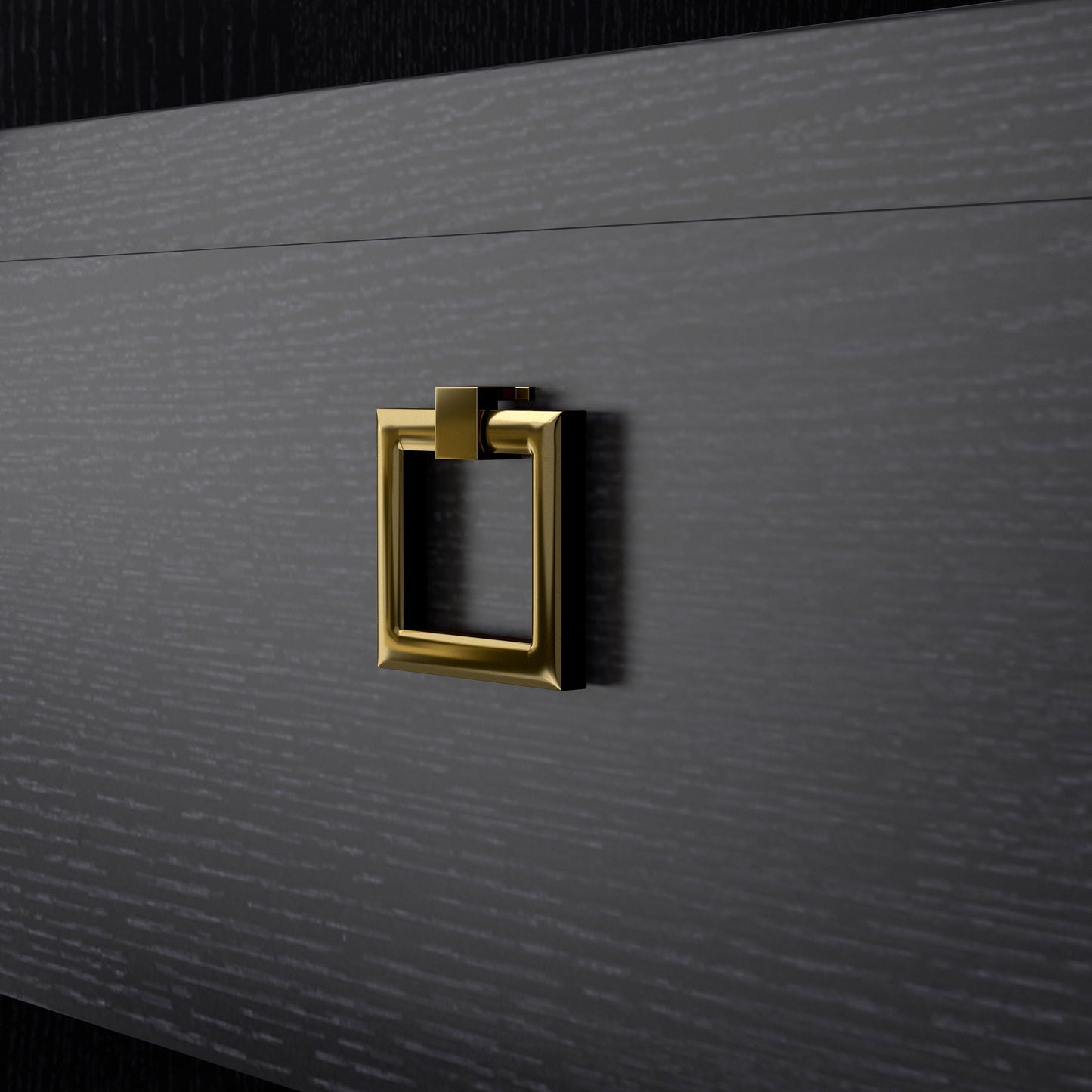 Left angled close-up gold square drawer pull detail on a modern black two-drawer nightstand/end table