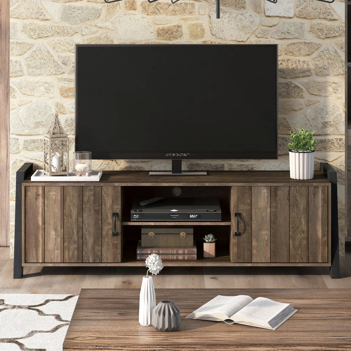 Front-facing farmhouse reclaimed oak and black six-shelf TV stand in a living room with accessories