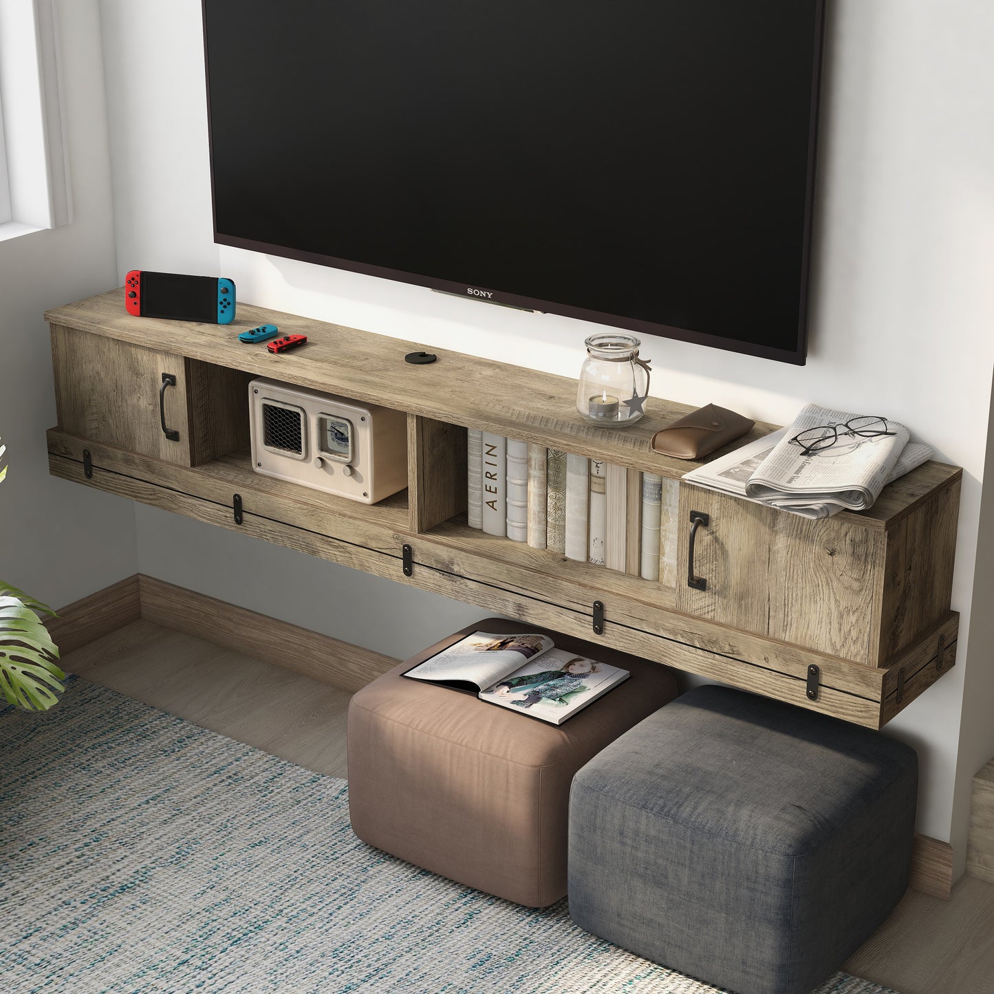 Left angled upper view of a rustic weathered oak two-door two-shelf floating TV stand in a living room with accessories