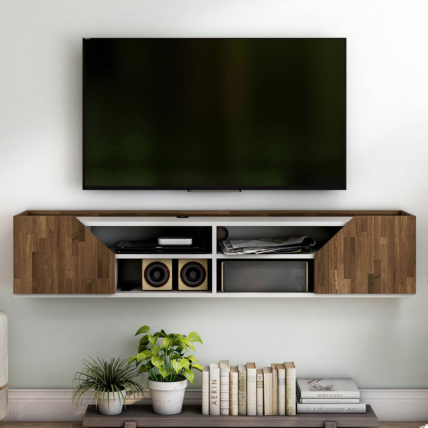 Front-facing transitional white and wood four-shelf floating TV stand in a living room with accessories