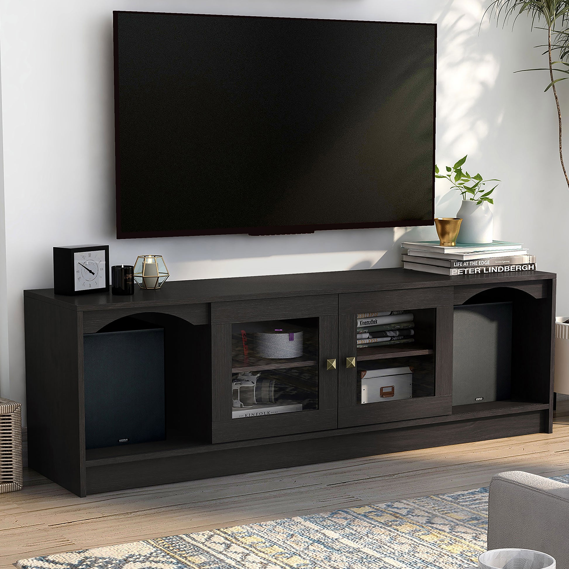 Right angled transitional espresso two-sliding door TV stand in a living room with accessories
