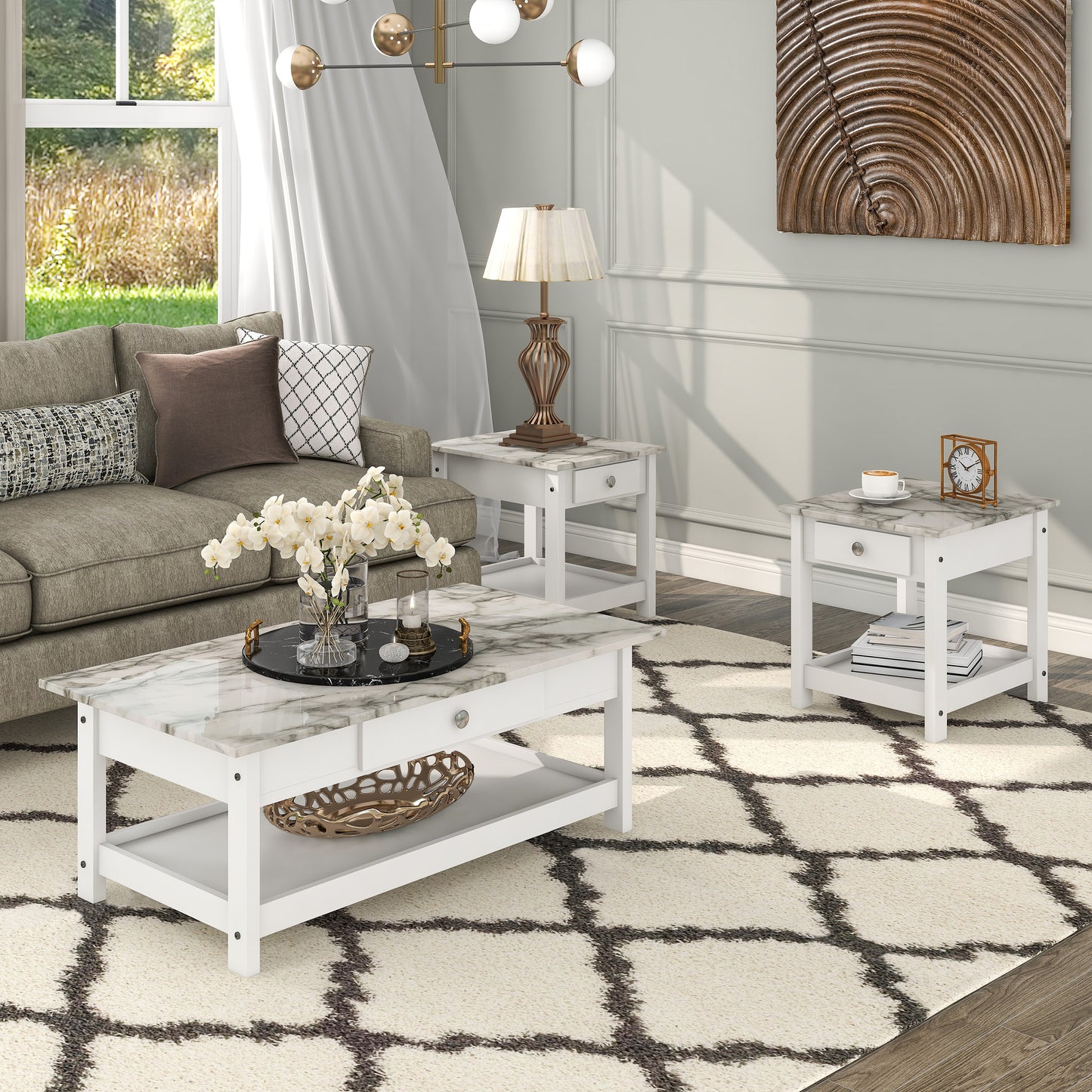Right angled three-piece modern white and faux marble coffee table set with lower shelves in a living area with accessories