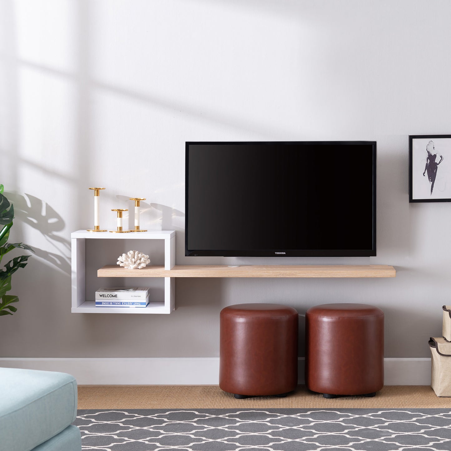 Front-facing modern white and light oak cube and open shelf floating TV stand in a living room with accessories
