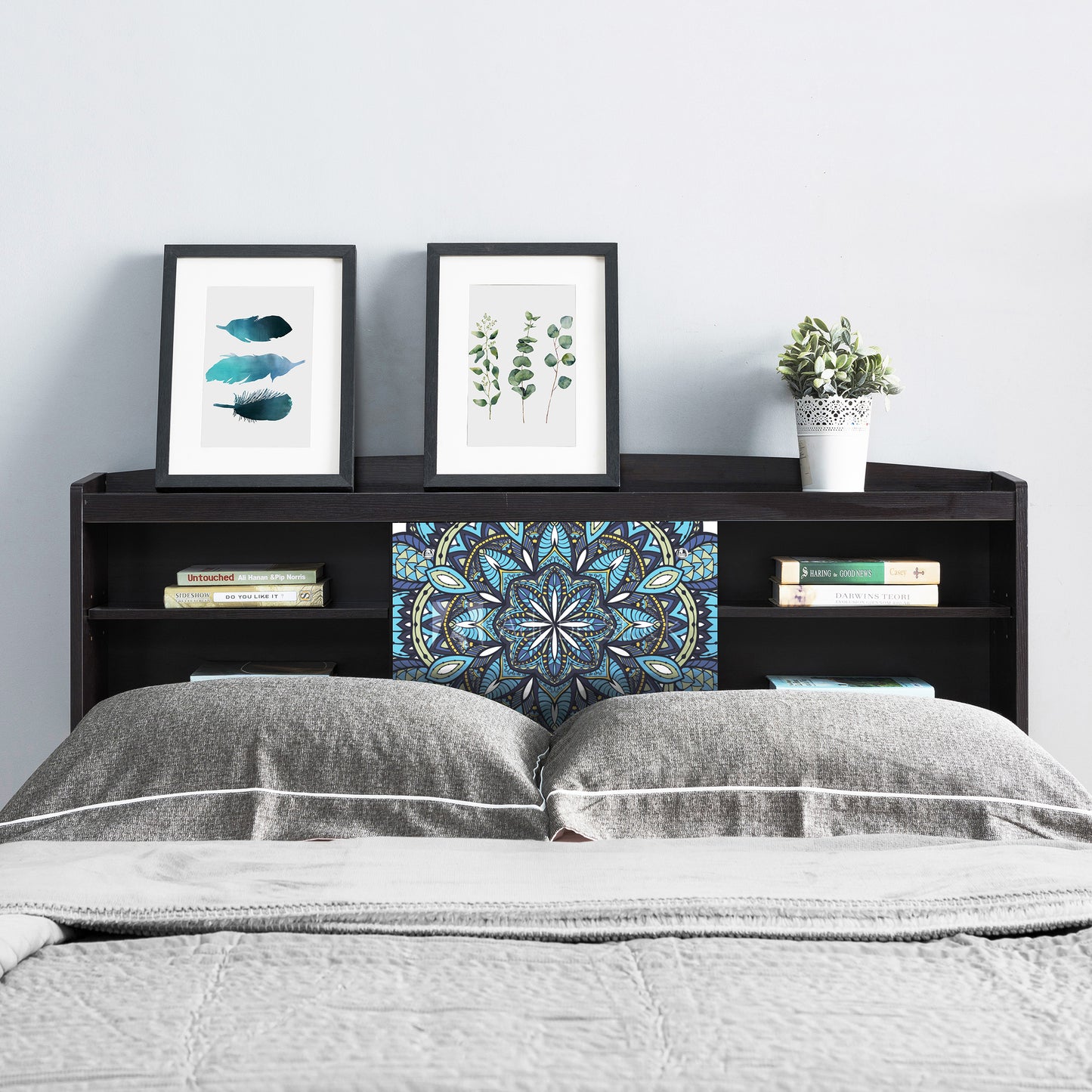 Front-facing contemporary cappuccino six-shelf bookcase headboard with sliding center panel in a bedroom with accessories