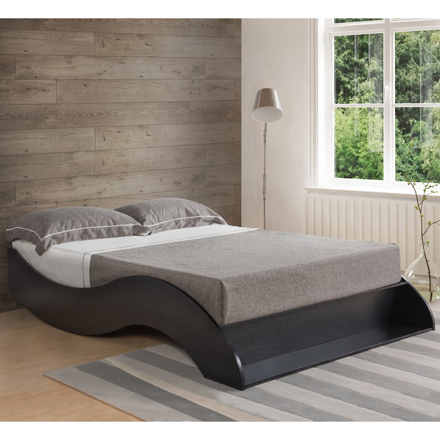 Right angled contemporary cappuccino curvy queen platform bed in a bedroom with accessories