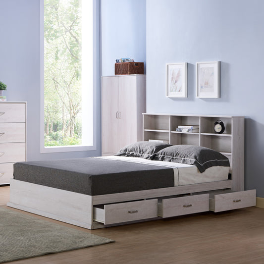 Left angled contemporary three-drawer storage bed shown with an optional bookcase headboard in a bedroom with accessories