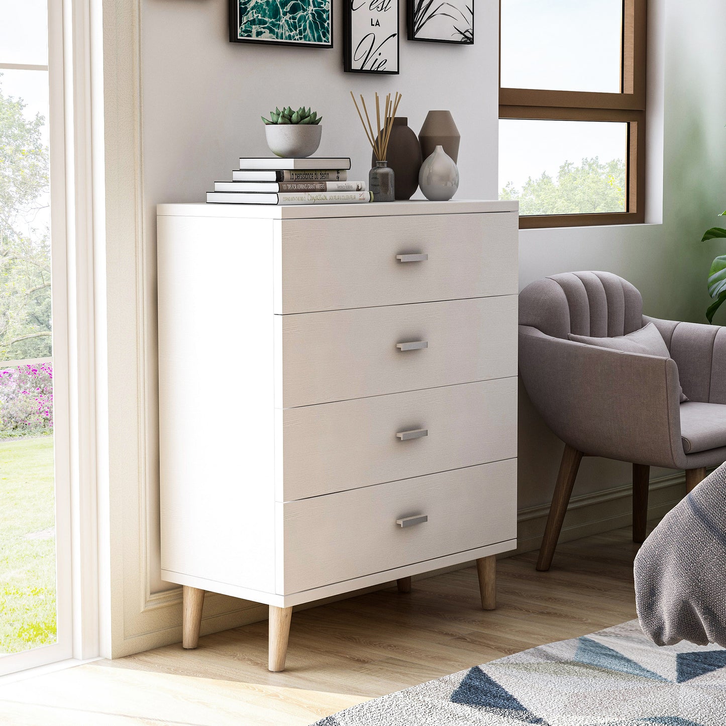 Right angled mid-century modern white four-drawer chest dresser in a bedroom with accessories