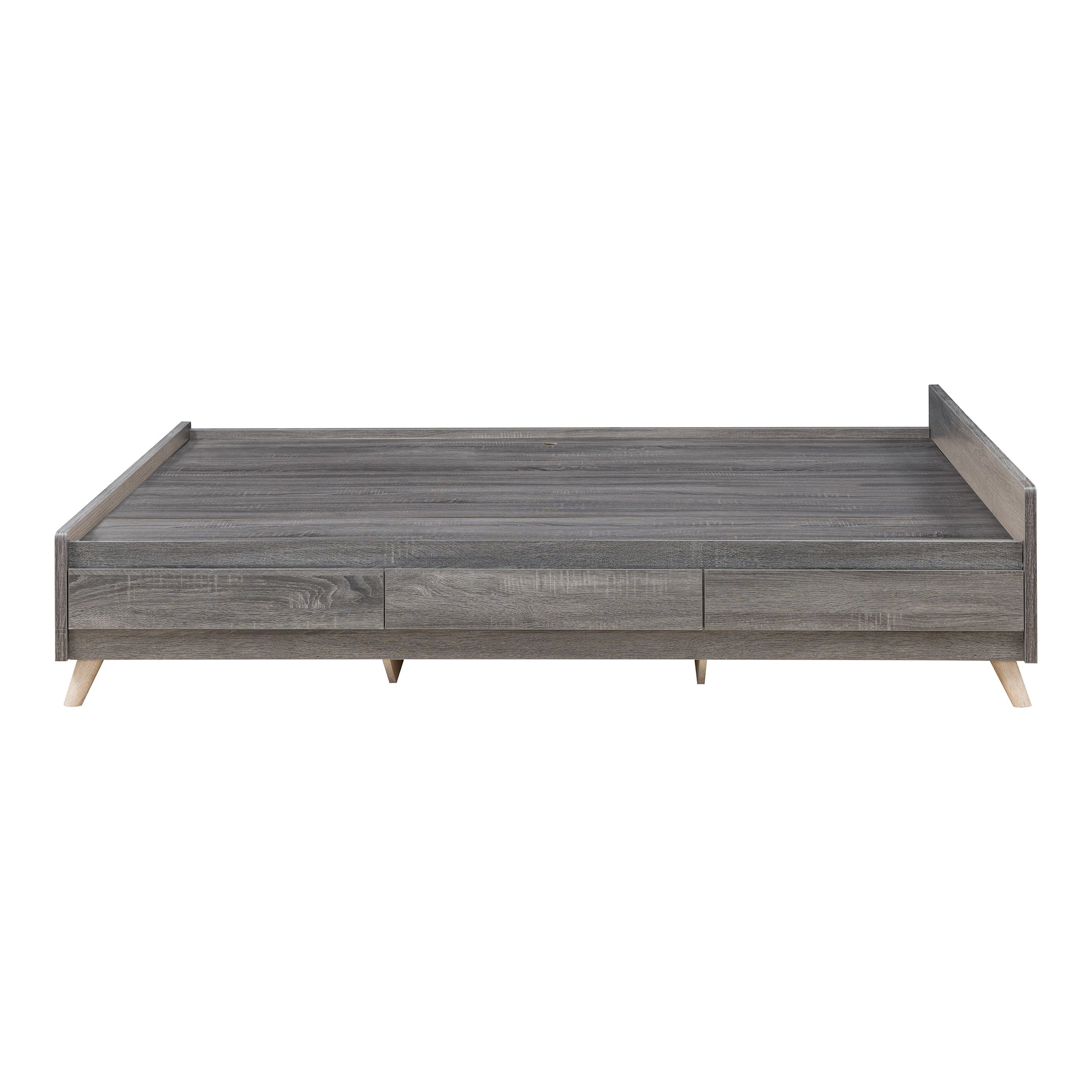 Front-facing side view of a mid-century modern distressed gray platform storage bed with three drawers on a white background