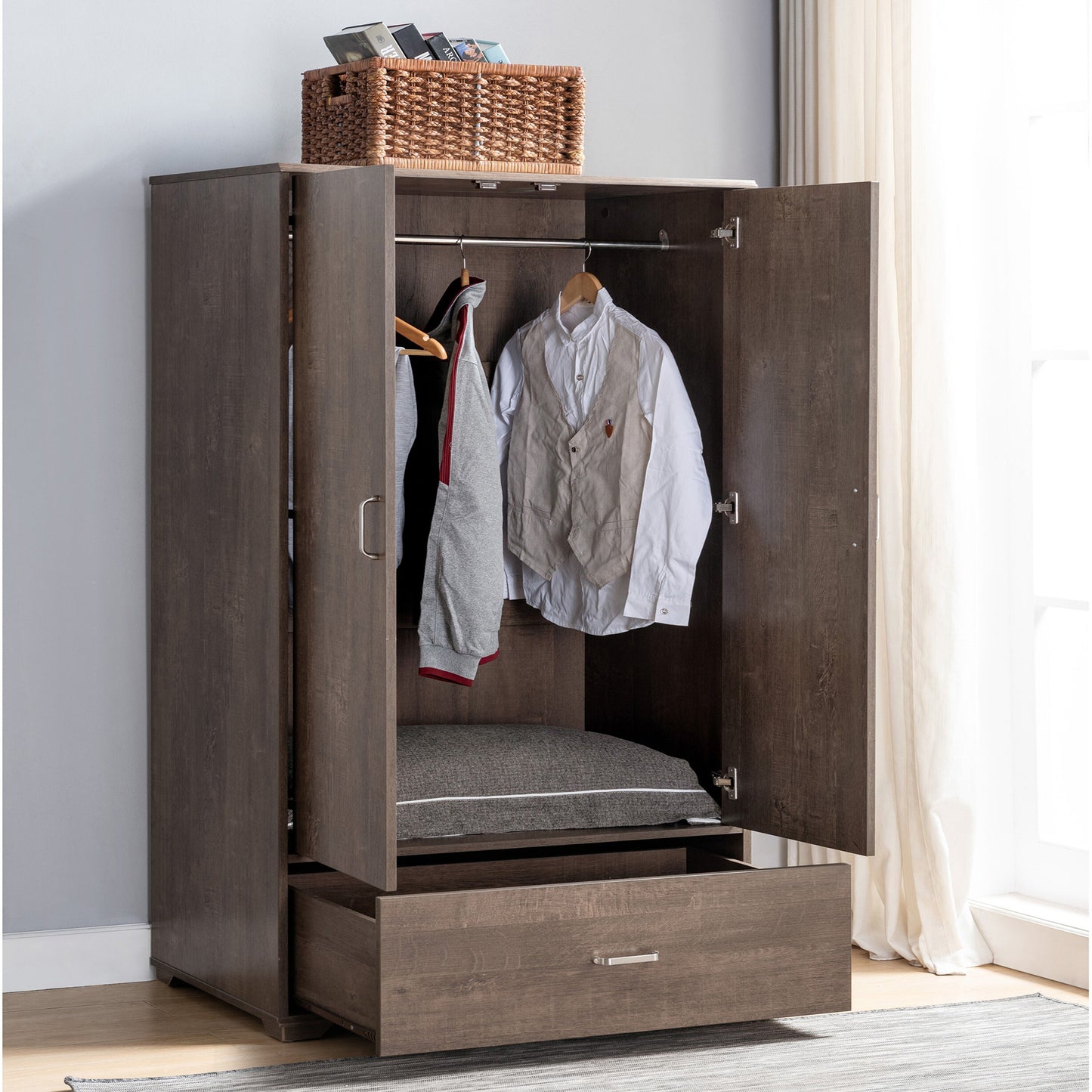 Right angled contemporary walnut two-door one-drawer wardrobe armoire with doors and drawer open in a bedroom with accessories