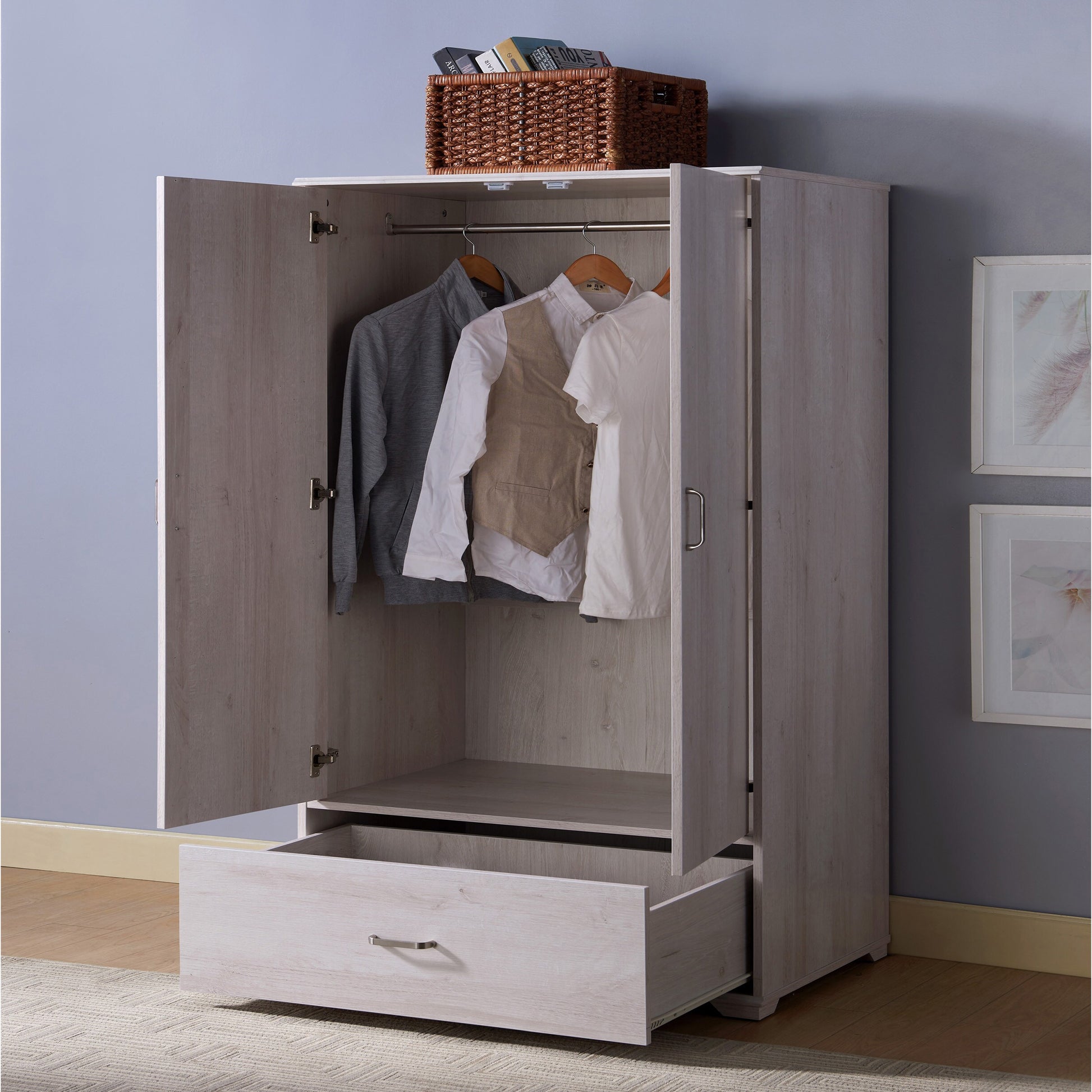 Left angled contemporary white oak two-door one-drawer wardrobe armoire with doors and drawer open with a rug and accessories