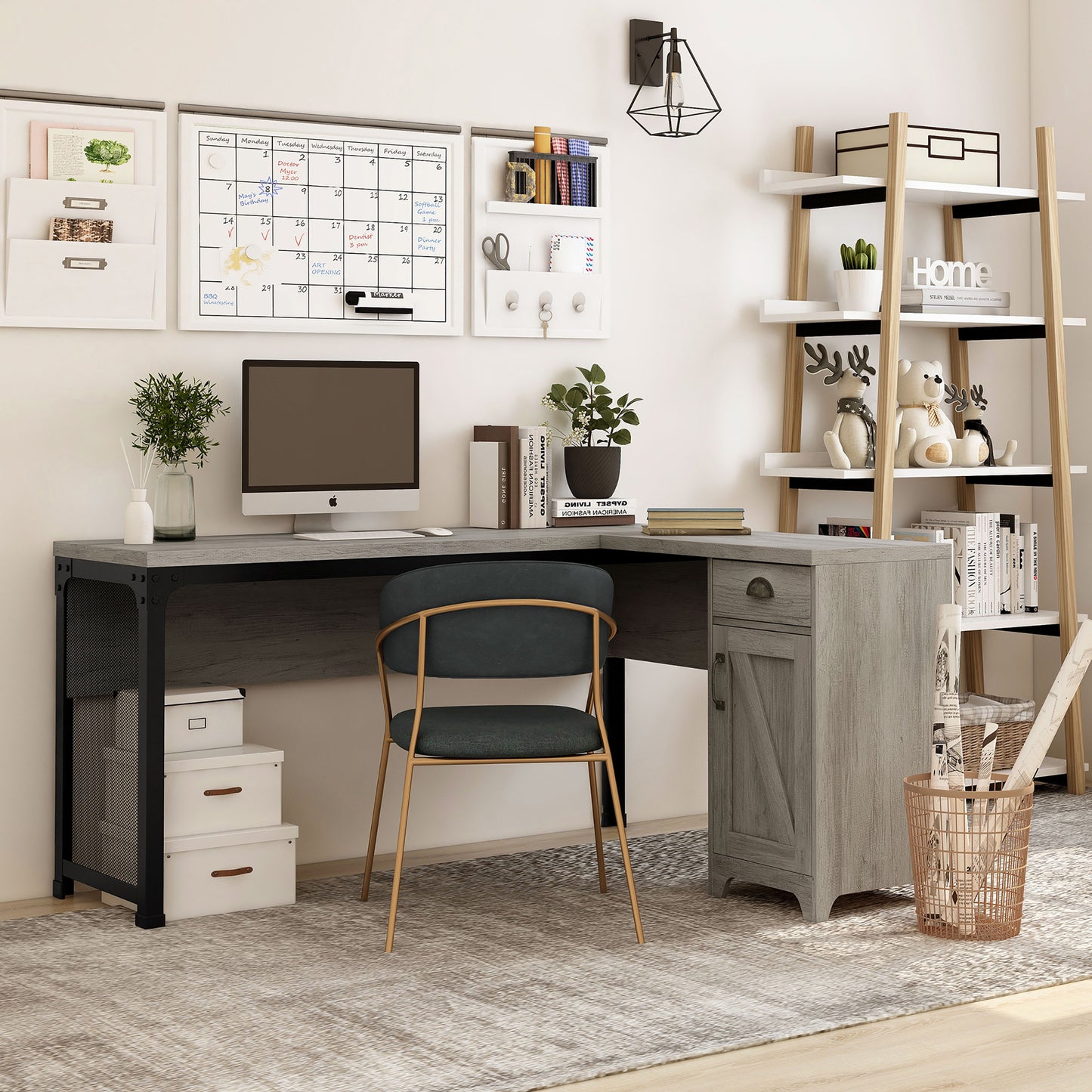 Right angled farmhouse vintage gray oak and black one-drawer L-shaped desk with a cabinet in a home office with accessories