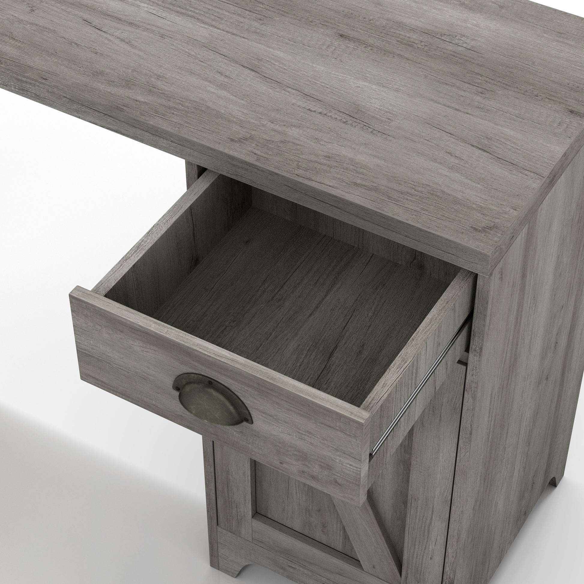 Right angled close-up view of a farmhouse vintage gray oak and black one-drawer L-shaped desk with a cabinet and drawer open on a white background