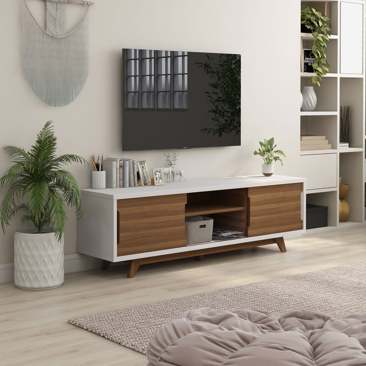 Right angled mid-century modern white and walnut two-door eight-shelf TV stand in a living room with accessories