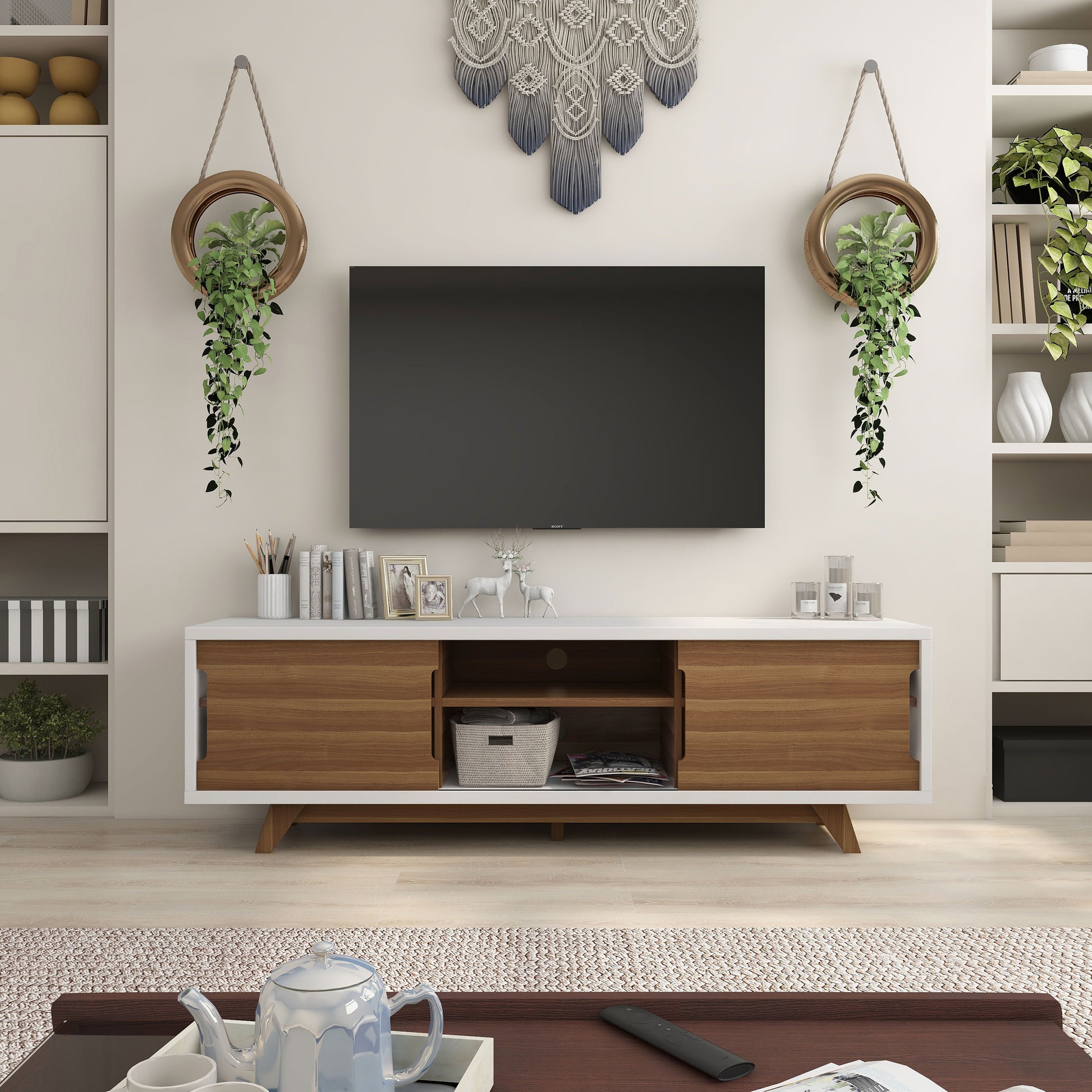 Front-facing mid-century modern white and walnut two-door eight-shelf TV stand in a living room with accessories