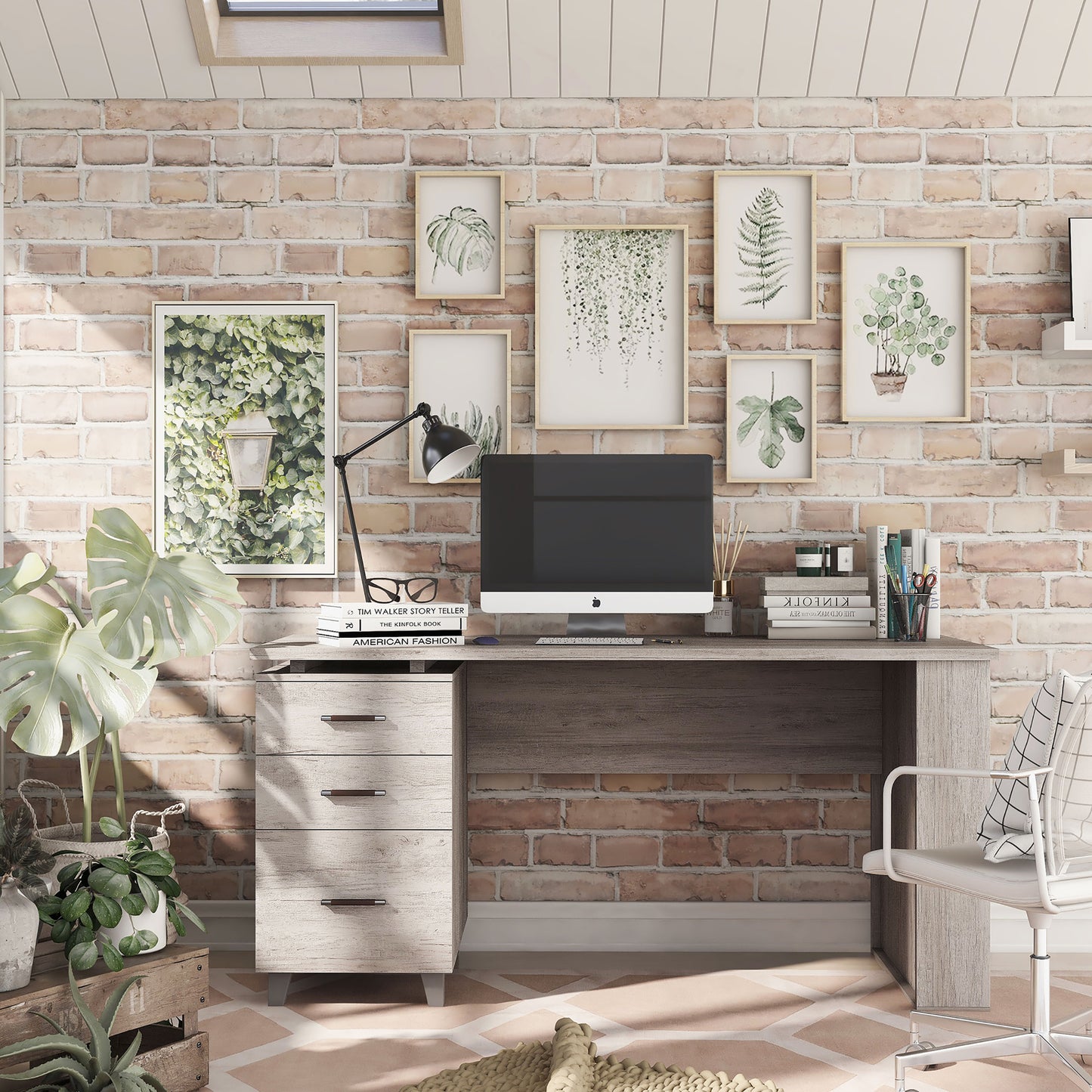 Front-facing transitional coastal white three-drawer office desk with magazine racks in a home office with accessories