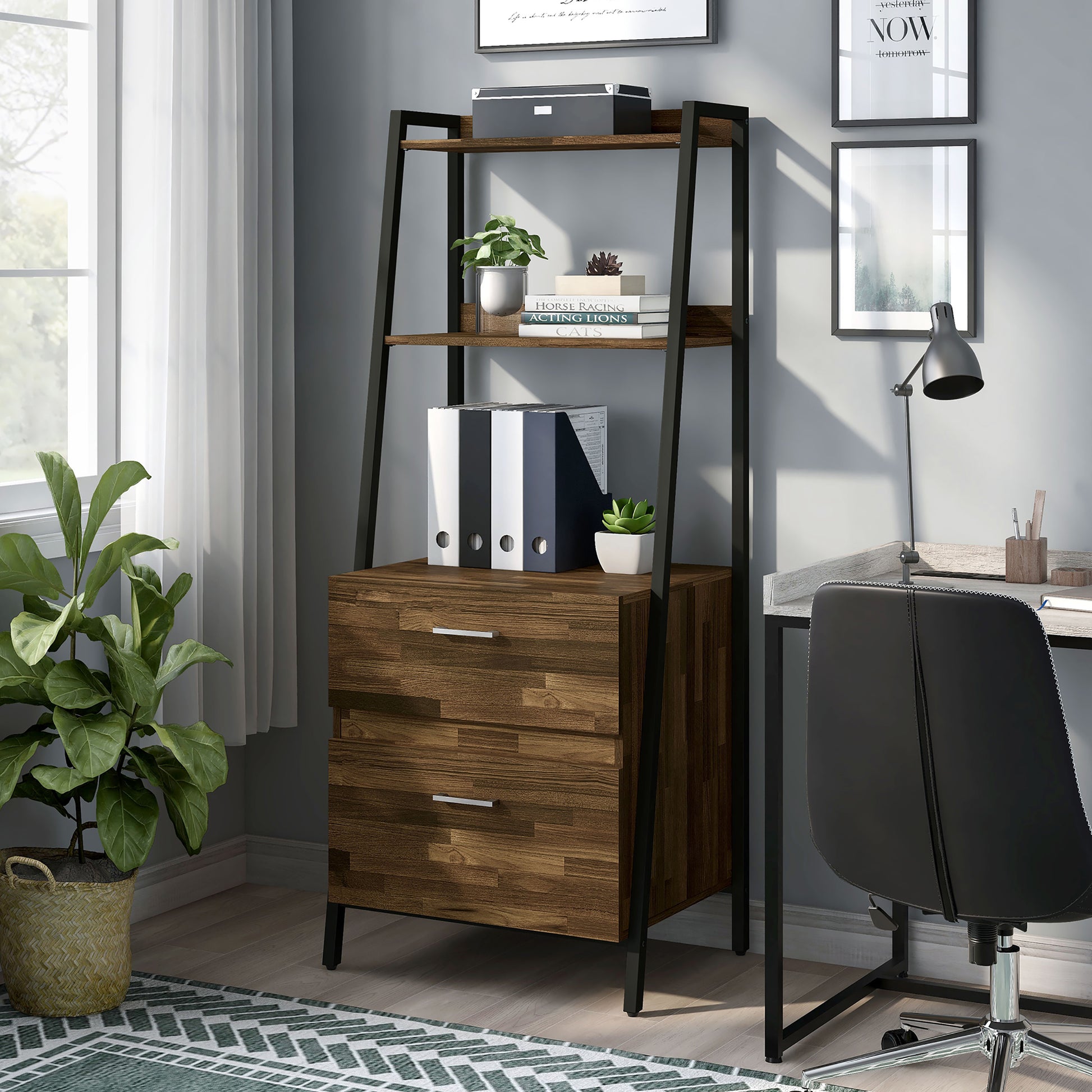 Left angled contemporary light hickory and black angular two-shelf bookcase with two-drawer file cabinet in a home office with accessories