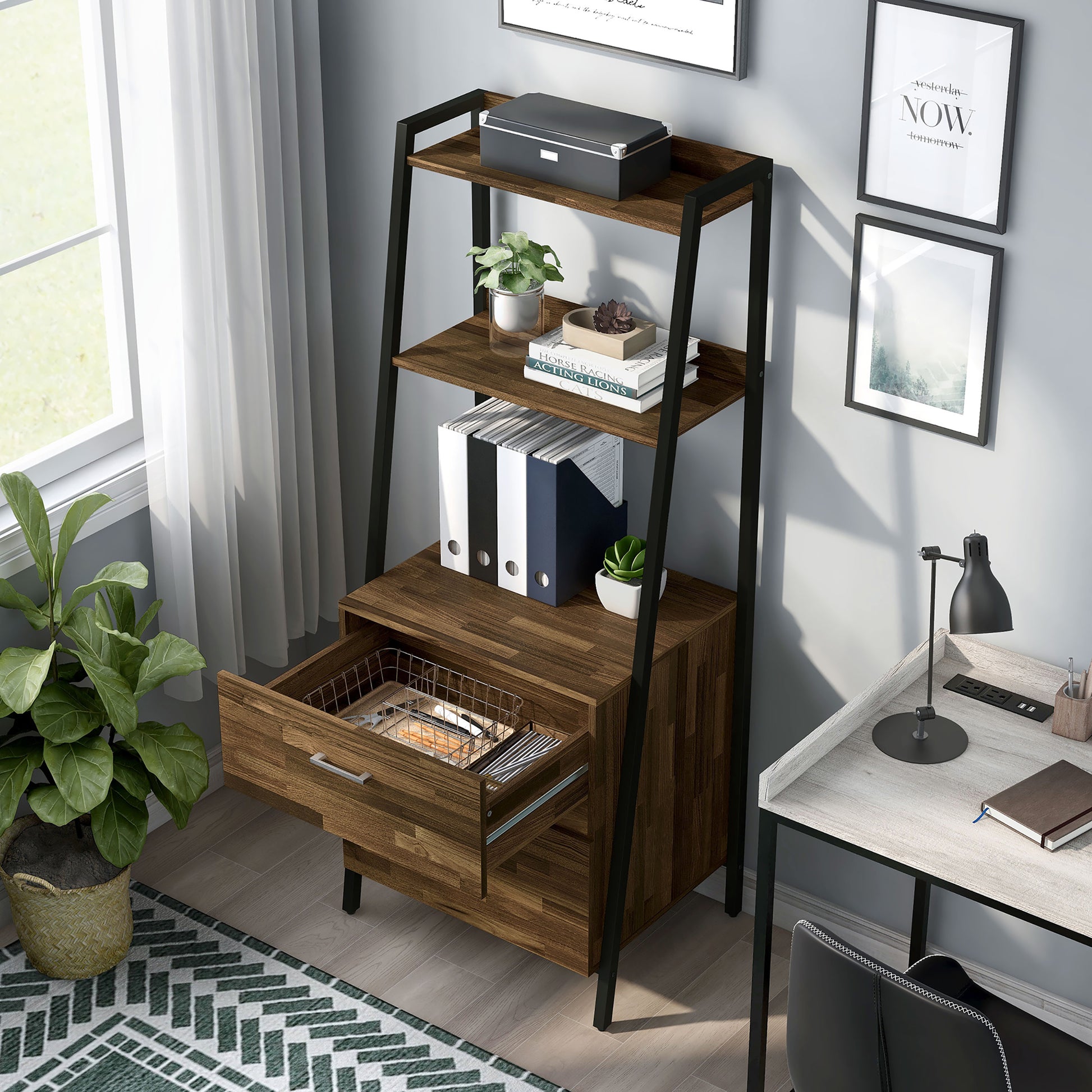 Left angled bird's eye view of a contemporary light hickory and black angular two-shelf bookcase with two-drawer file cabinet with top drawer open in a home office with accessories
