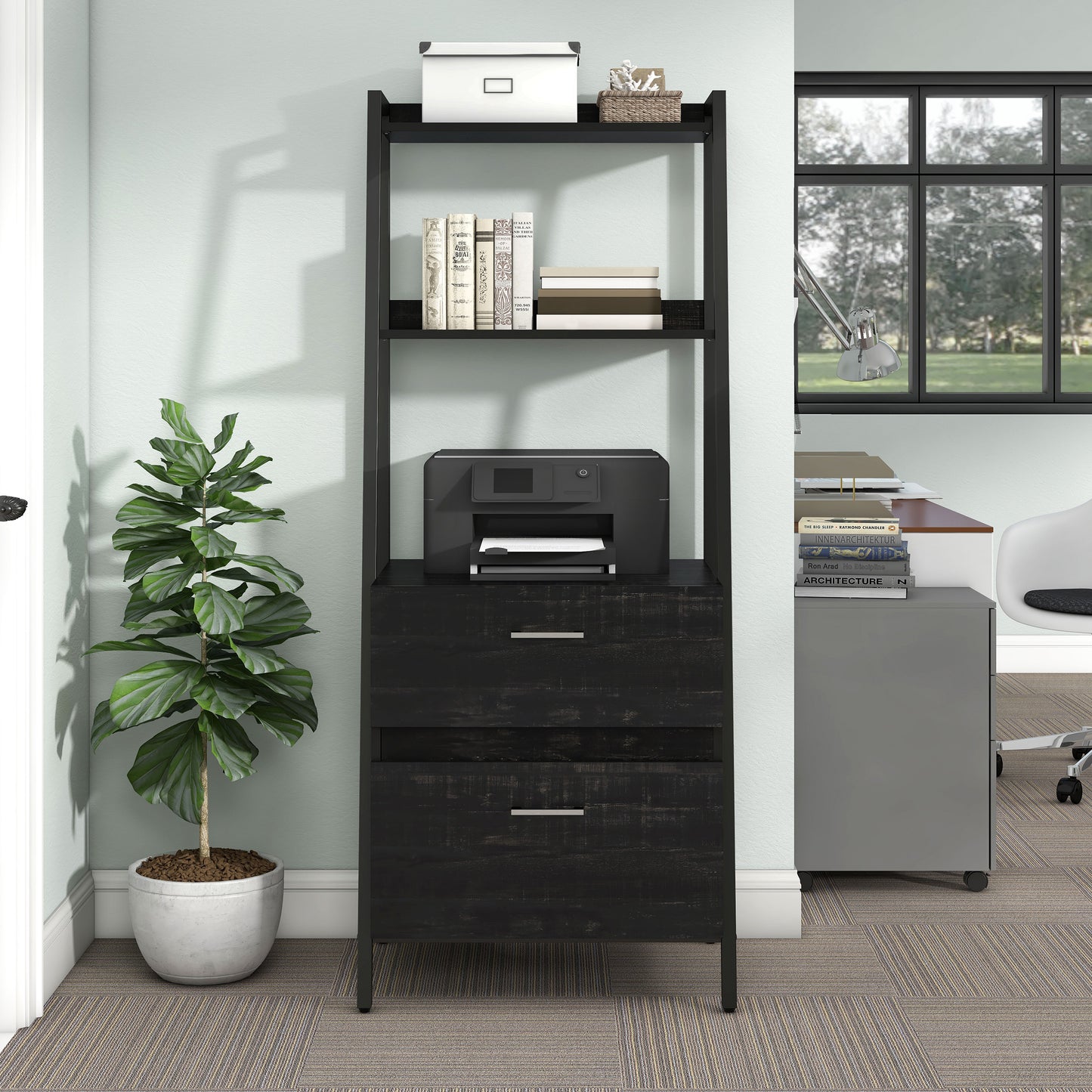 Front-facing contemporary reclaimed black oak and black angular two-shelf bookcase with two-drawer file cabinet in a home office with accessories