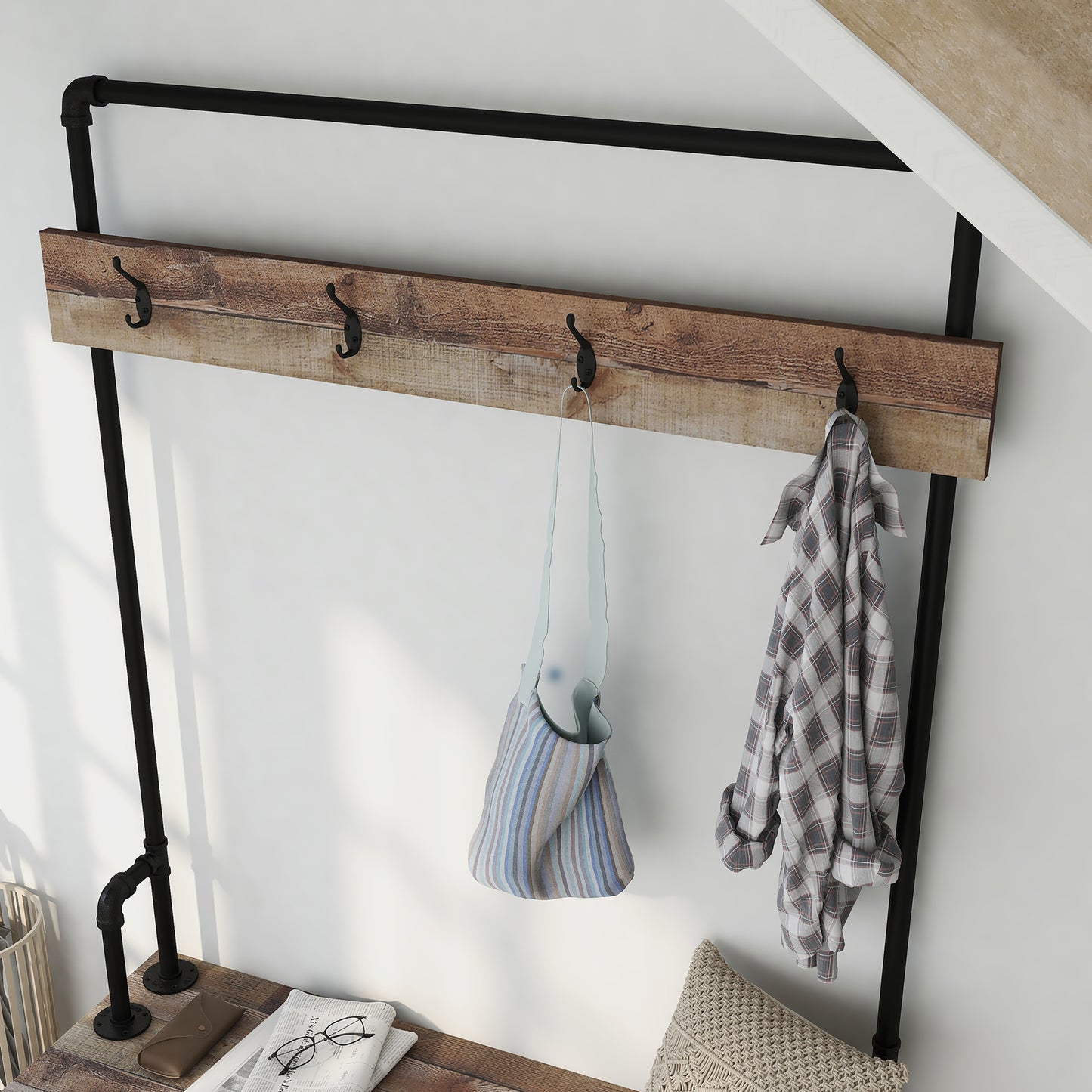 Left angled close-up view of an industrial reclaimed barnwood water pipe four-shelf entryway coat rack bench in an entry with accessories