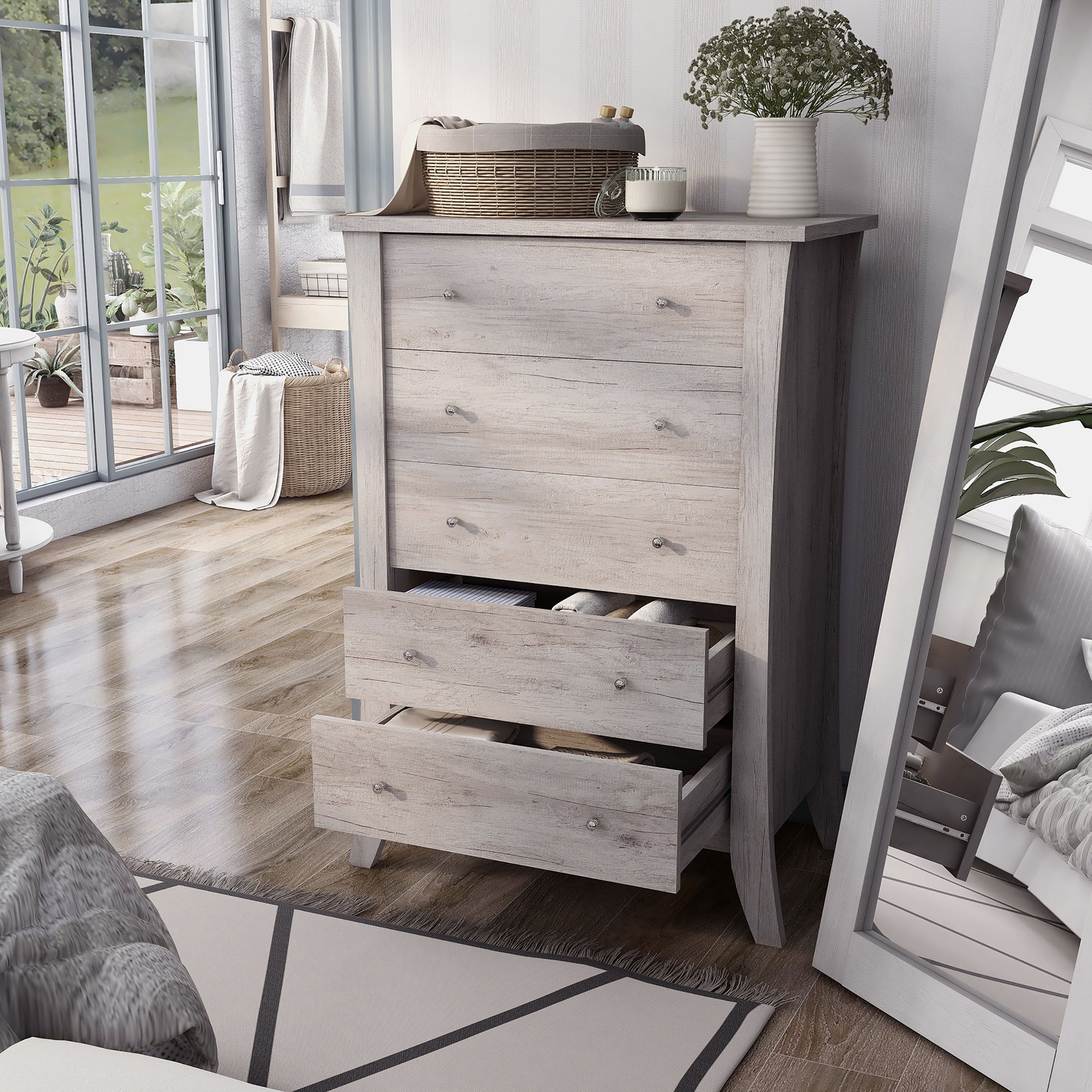 Left angled transitional coastal white five-drawer chest with two drawers open in a bedroom with accessories