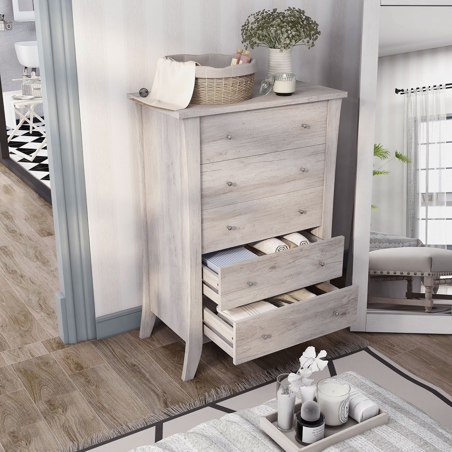 Right angled bird's eye view of a transitional coastal white five-drawer chest with two drawers open in a bedroom with accessories