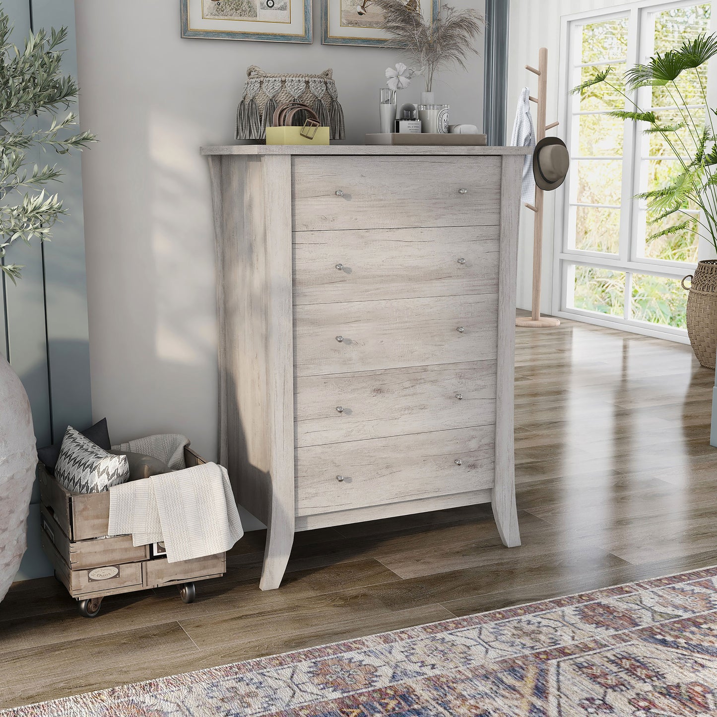 Right angled transitional coastal white five-drawer chest in a living area with accessories