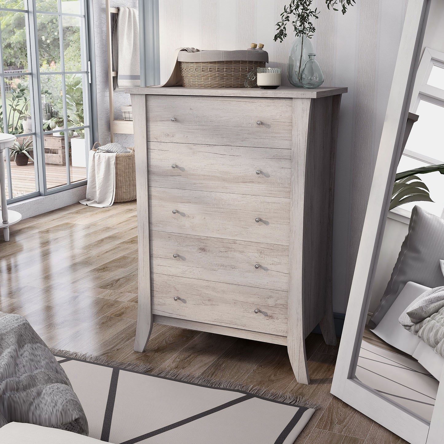 Left angled transitional coastal white five-drawer chest in a bedroom with accessories