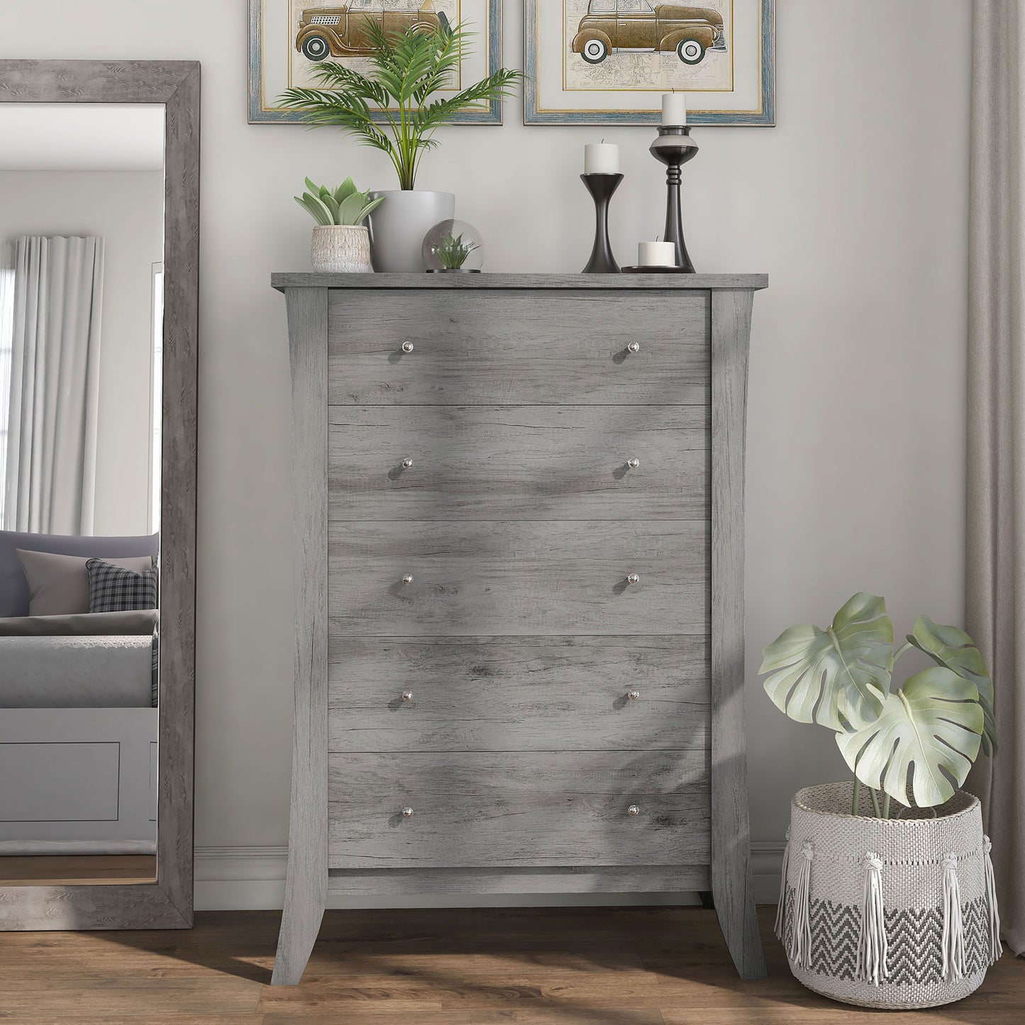 Front-facing transitional vintage gray oak five-drawer chest in a bedroom with accessories