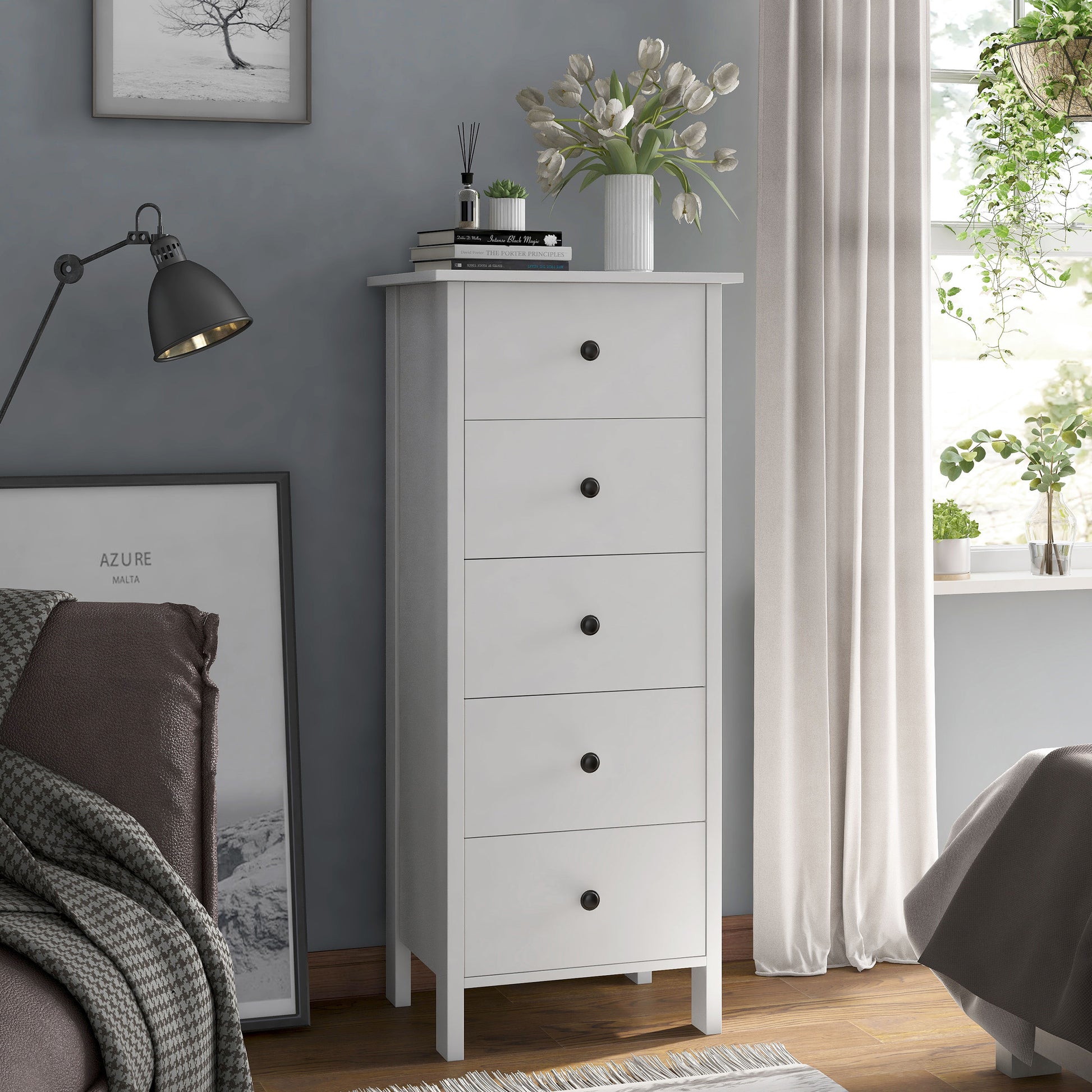 Right angled transitional white slim five-drawer chest in a bedroom with accessories
